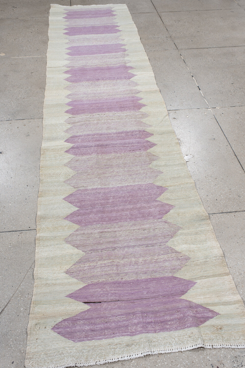 2' x 12' one-of-a-kind handmade vintage Kilim runner rug. Color palette: ivory, lavender, blush, cream, light gray, pink