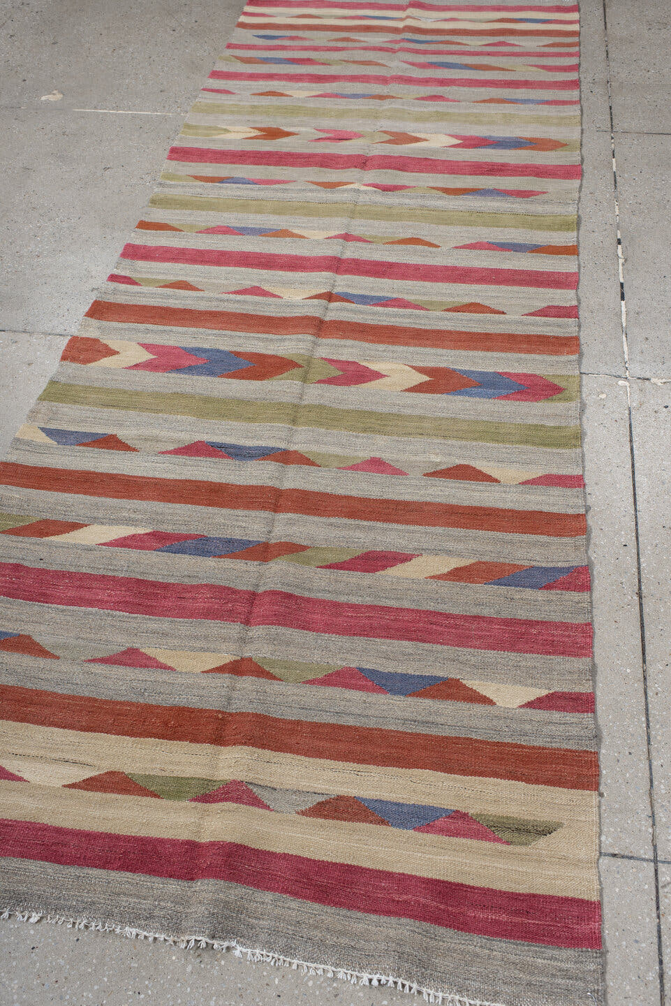 3' x 9' one-of-a-kind handmade vintage Kilim runner rug. Color palette: ivory, rose, rust, olive, blue, taupe, pink, red