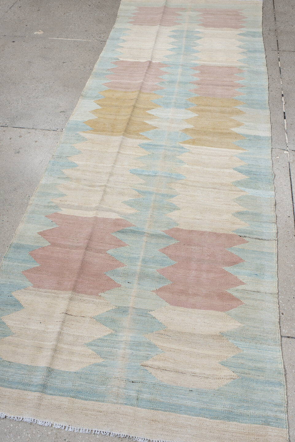 3' x 9' one-of-a-kind handmade vintage Kilim runner rug. Color palette: ivory, pale blue, blush, gold, cream, light blue