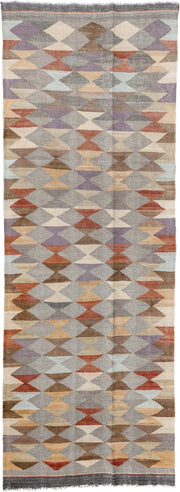 3' x 9' one-of-a-kind handmade vintage Kilim runner rug. Color palette: gray, taupe, ivory, brown, rust, lavender, camel