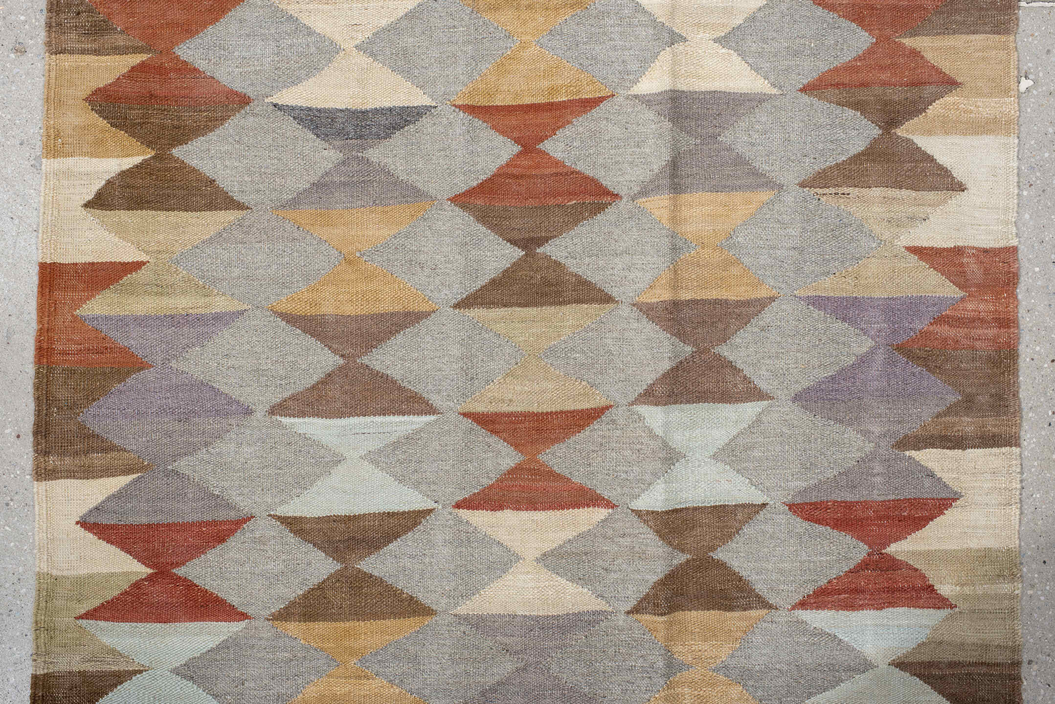 3' x 9' one-of-a-kind handmade vintage Kilim runner rug. Color palette: gray, taupe, ivory, brown, rust, lavender, camel