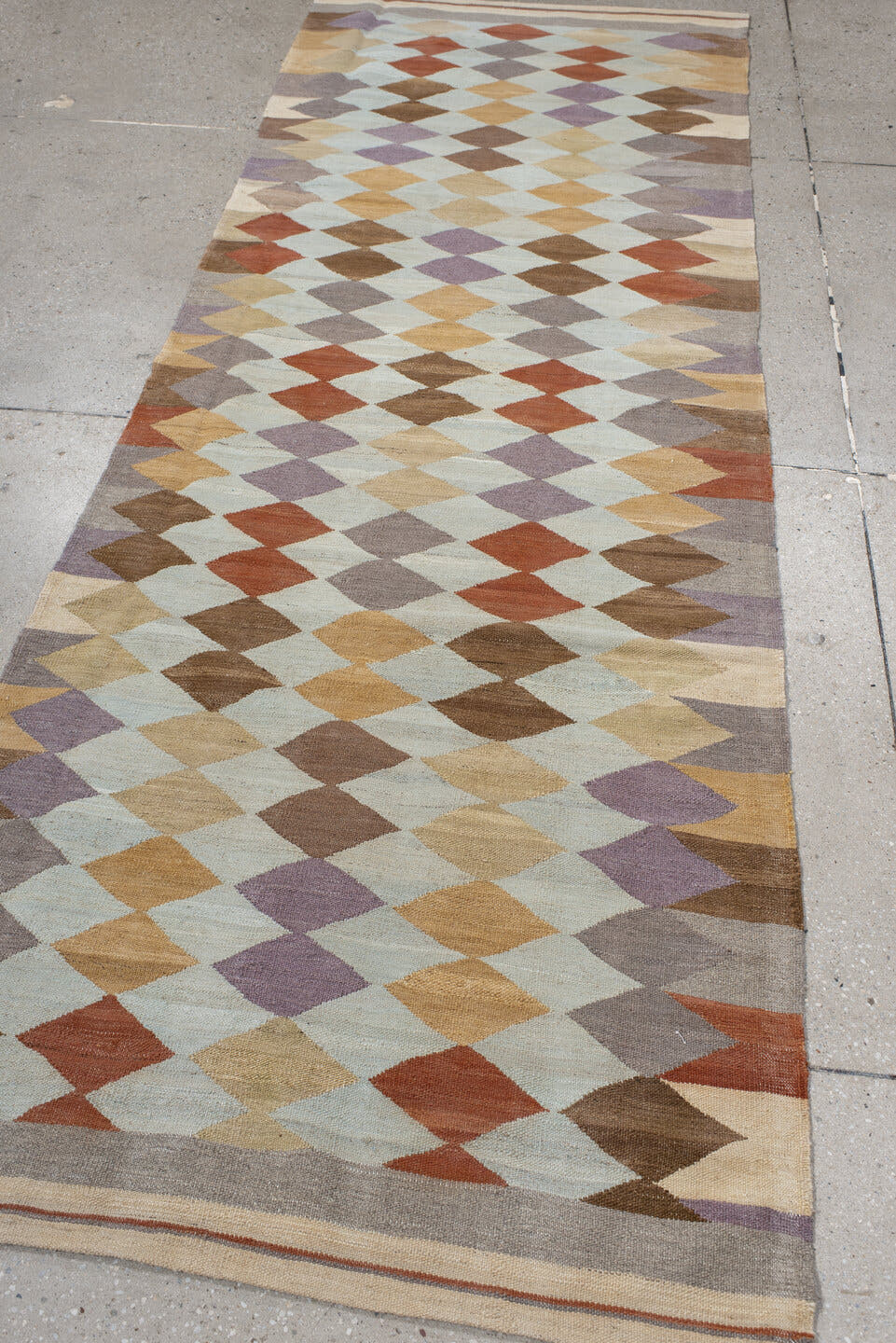 3' x 9' one-of-a-kind handmade vintage Kilim runner rug. Color palette: ivory, taupe, camel, lavender, rust, brown, sand