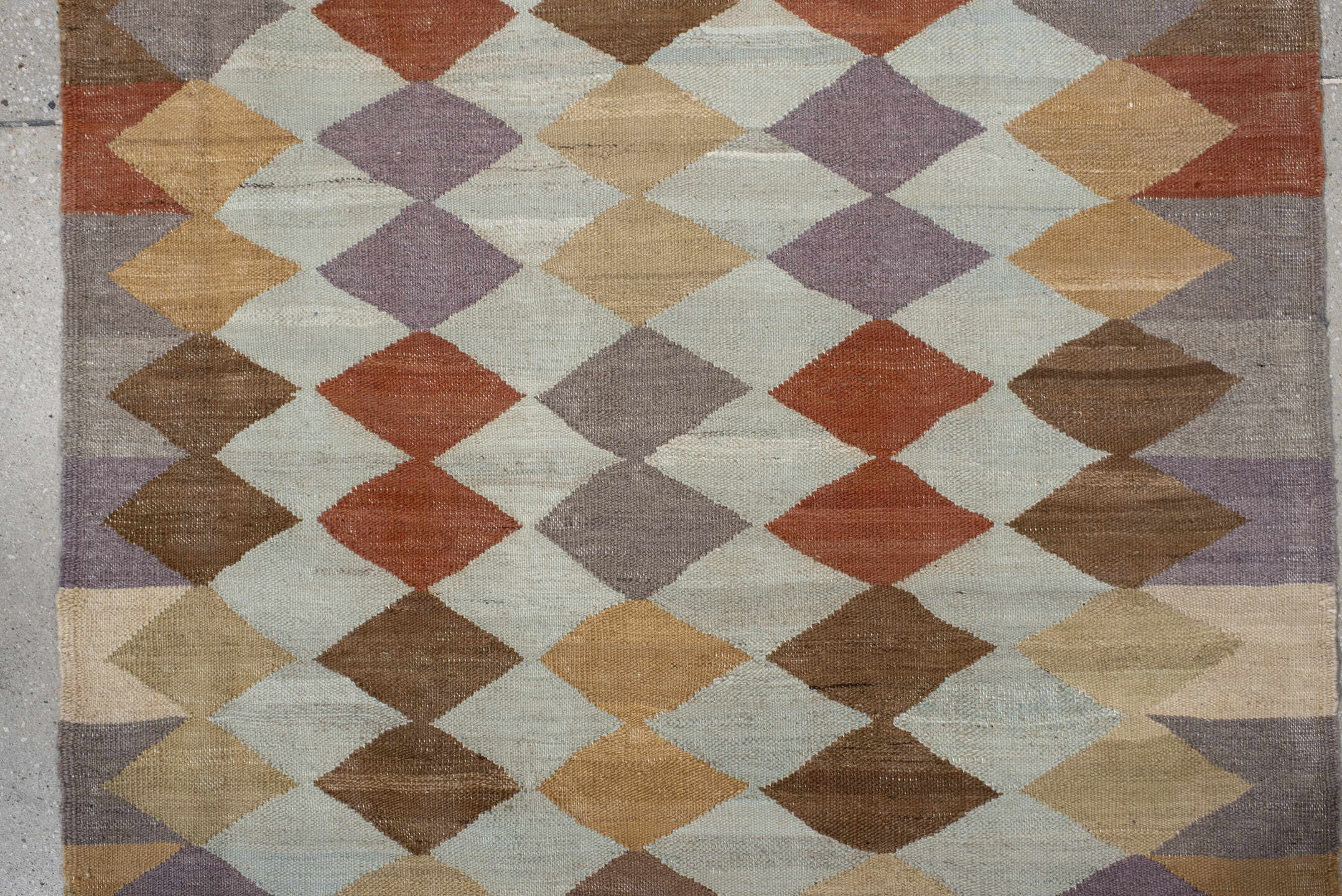 3' x 9' one-of-a-kind handmade vintage Kilim runner rug. Color palette: ivory, taupe, camel, lavender, rust, brown, sand