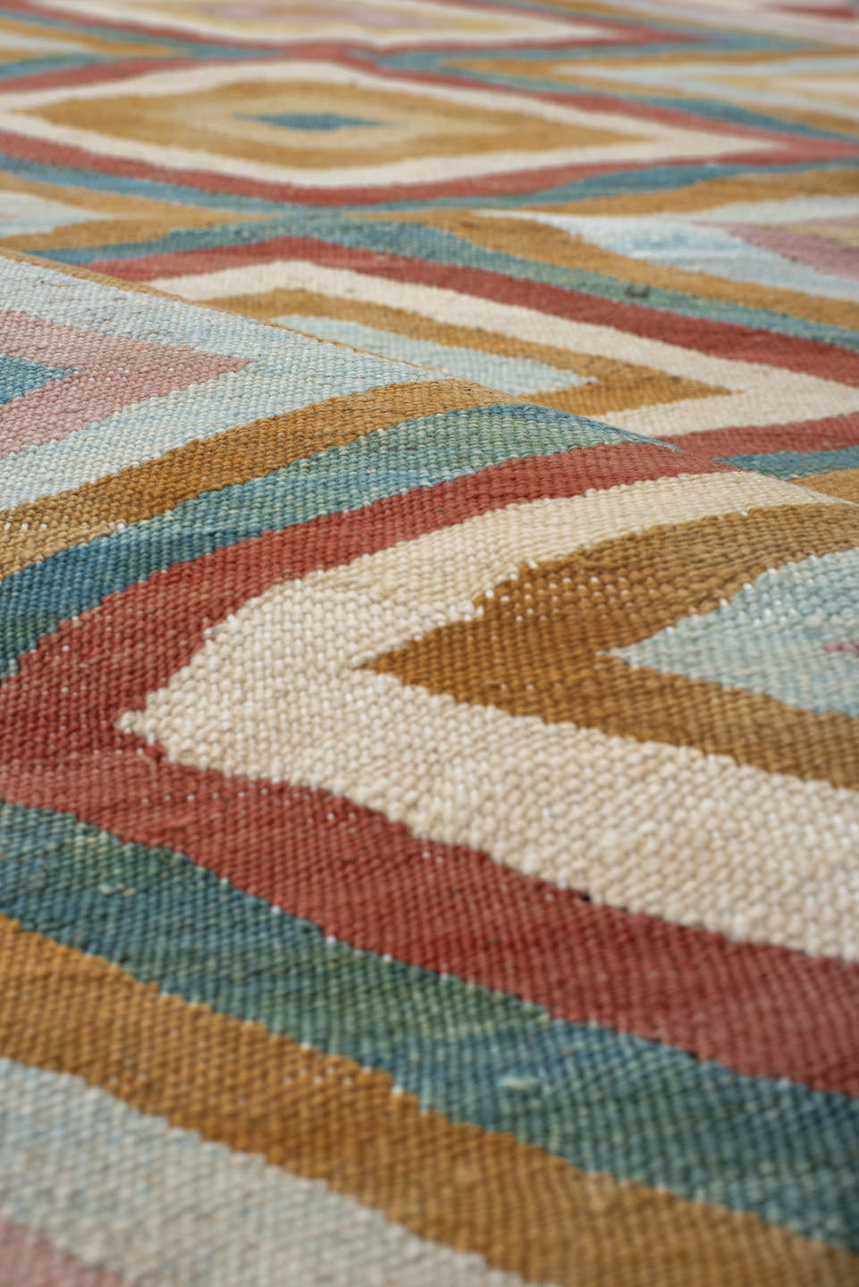 2' x 9' one-of-a-kind handmade vintage Kilim runner rug. Color palette: ivory, gold, rust, blush, teal, camel, pale blue