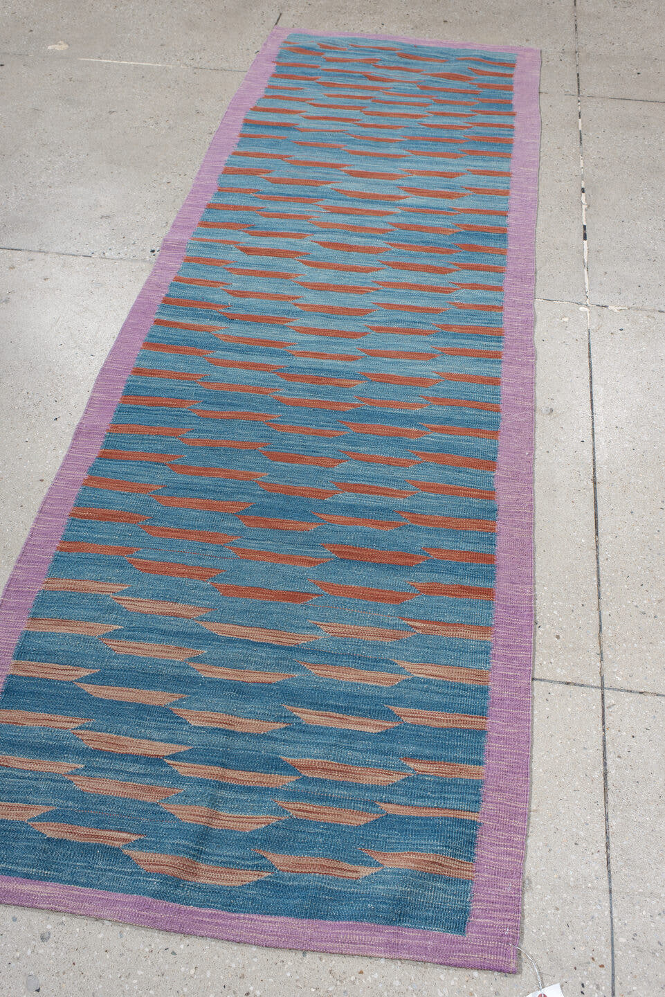 2' x 8' one-of-a-kind handmade vintage Kilim runner rug. Color palette: turquoise, lavender, rust, rose, teal, ivory