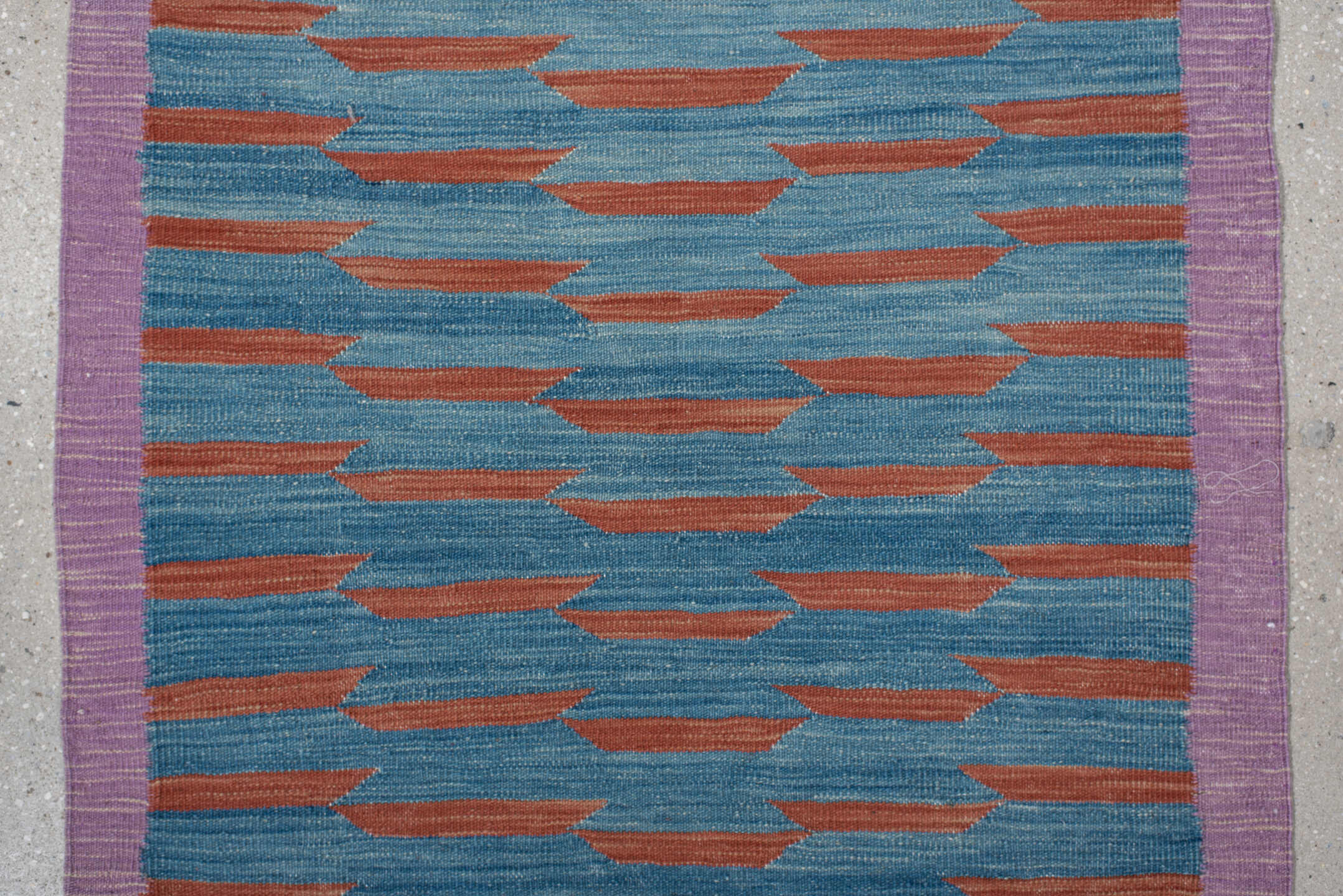 2' x 8' one-of-a-kind handmade vintage Kilim runner rug. Color palette: turquoise, lavender, rust, rose, teal, ivory