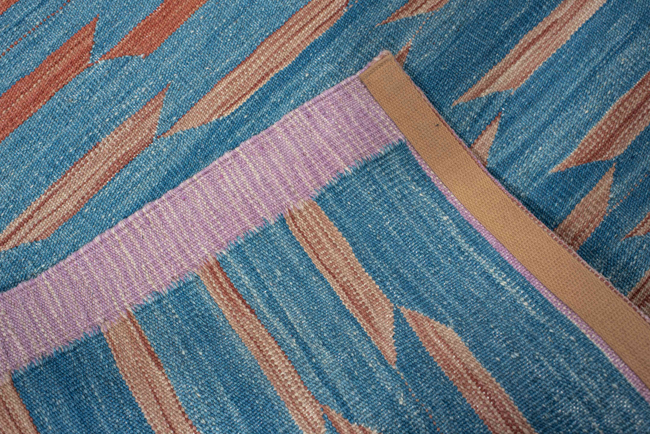 2' x 8' one-of-a-kind handmade vintage Kilim runner rug. Color palette: turquoise, lavender, rust, rose, teal, ivory