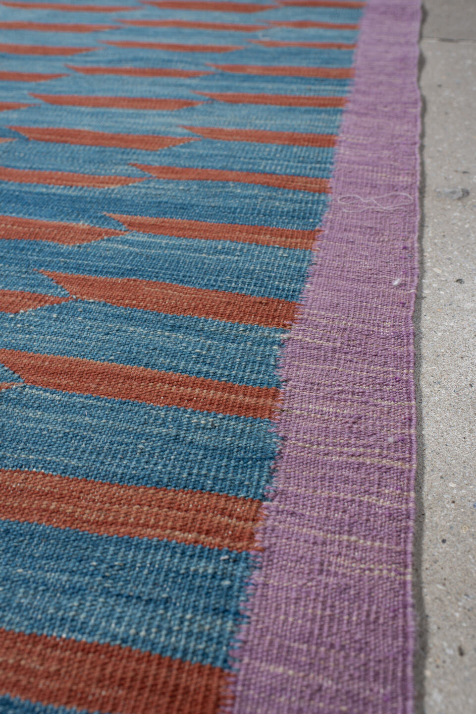 2' x 8' one-of-a-kind handmade vintage Kilim runner rug. Color palette: turquoise, lavender, rust, rose, teal, ivory