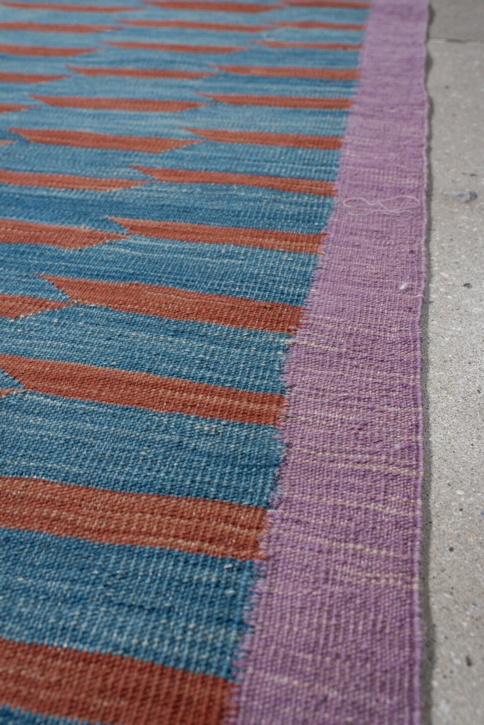 2' x 8' one-of-a-kind handmade vintage Kilim runner rug. Color palette: blue, brown, fiord, gray, light blue, light gray