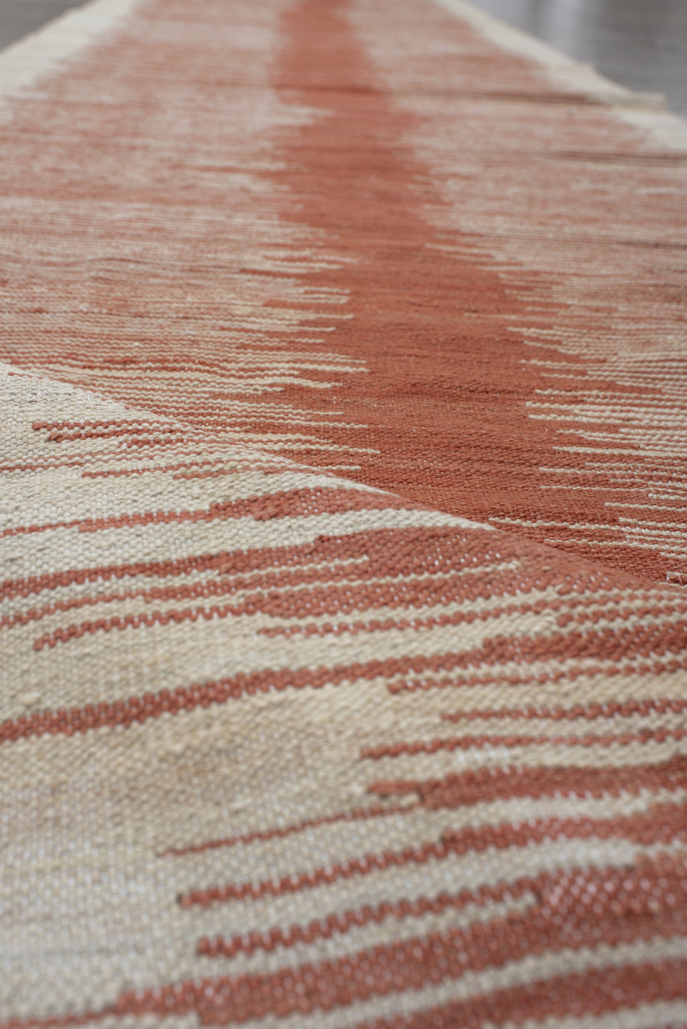 2' x 12' one-of-a-kind handmade vintage Kilim runner rug. Color palette: brown, gray, light gray, off-white, orange, pink