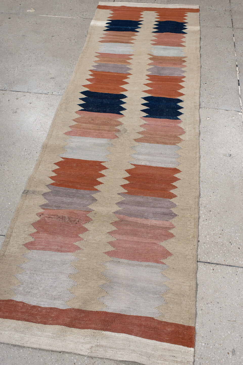 2' x 8' one-of-a-kind handmade vintage Kilim runner rug. Color palette: ivory, rust, navy, blush, light gray, taupe