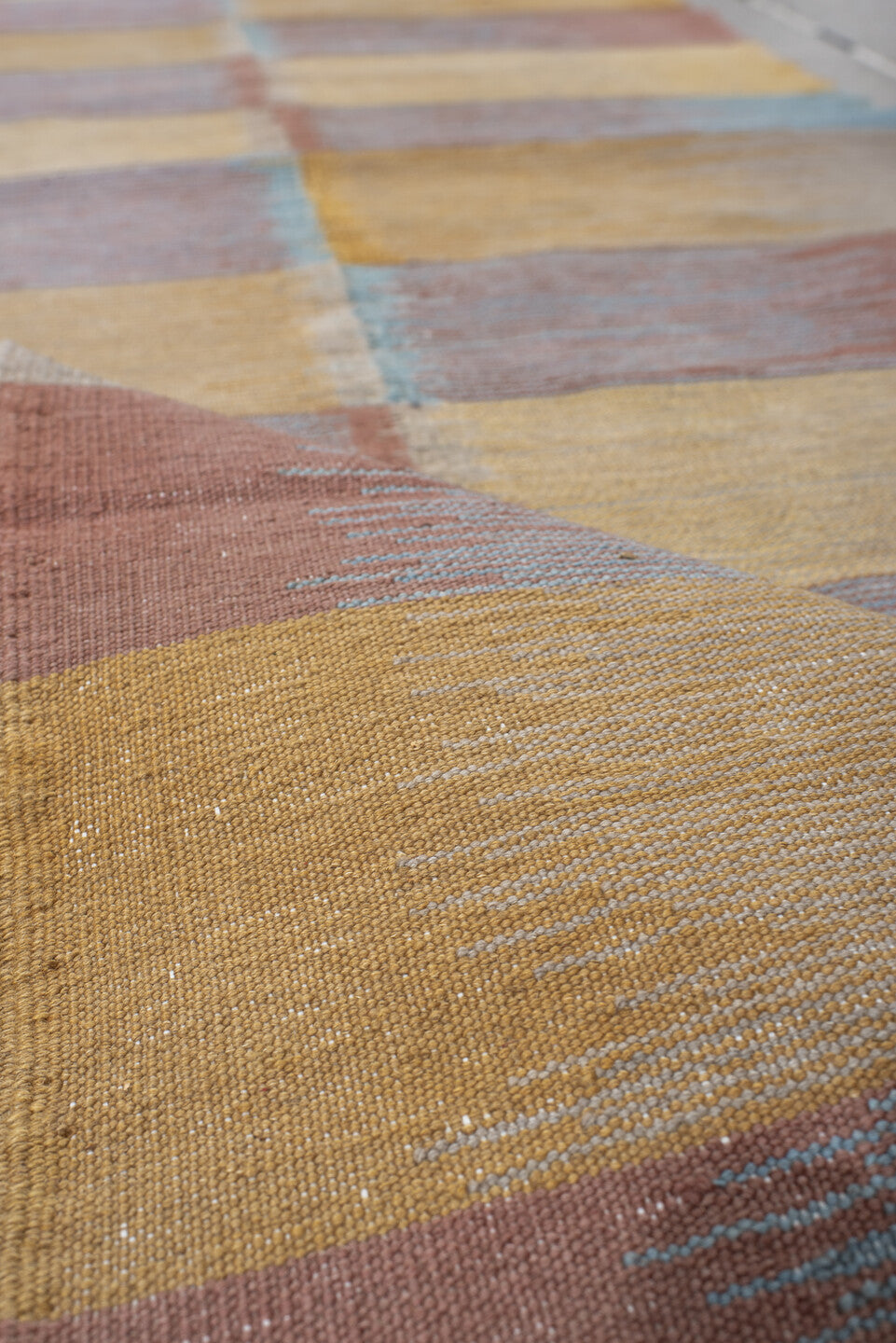 2' x 7' one-of-a-kind handmade vintage Kilim runner rug. Color palette: gold, taupe, rose, sky blue, beige, gray, pink, red