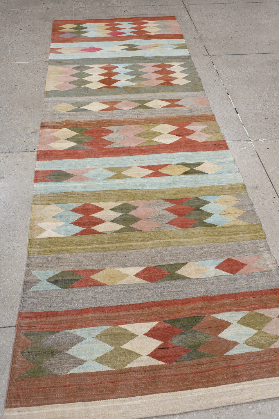 3' x 9' one-of-a-kind handmade vintage Kilim runner rug. Color palette: rust, gray, olive, ivory, sky_blue, blush, taupe