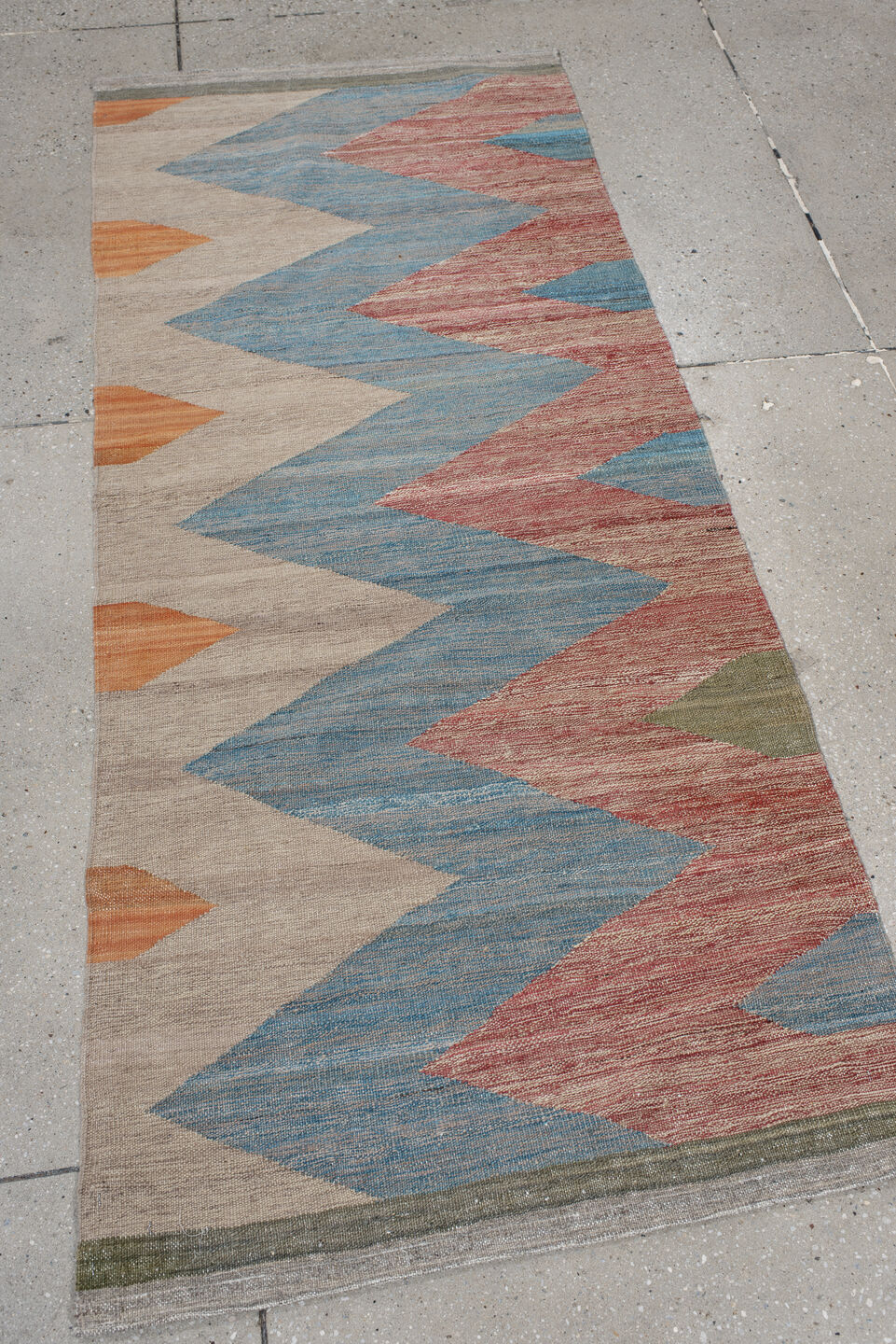 2' x 6' one-of-a-kind handmade vintage Kilim runner rug. Color palette: ivory, sky blue, rust, orange, olive, gray