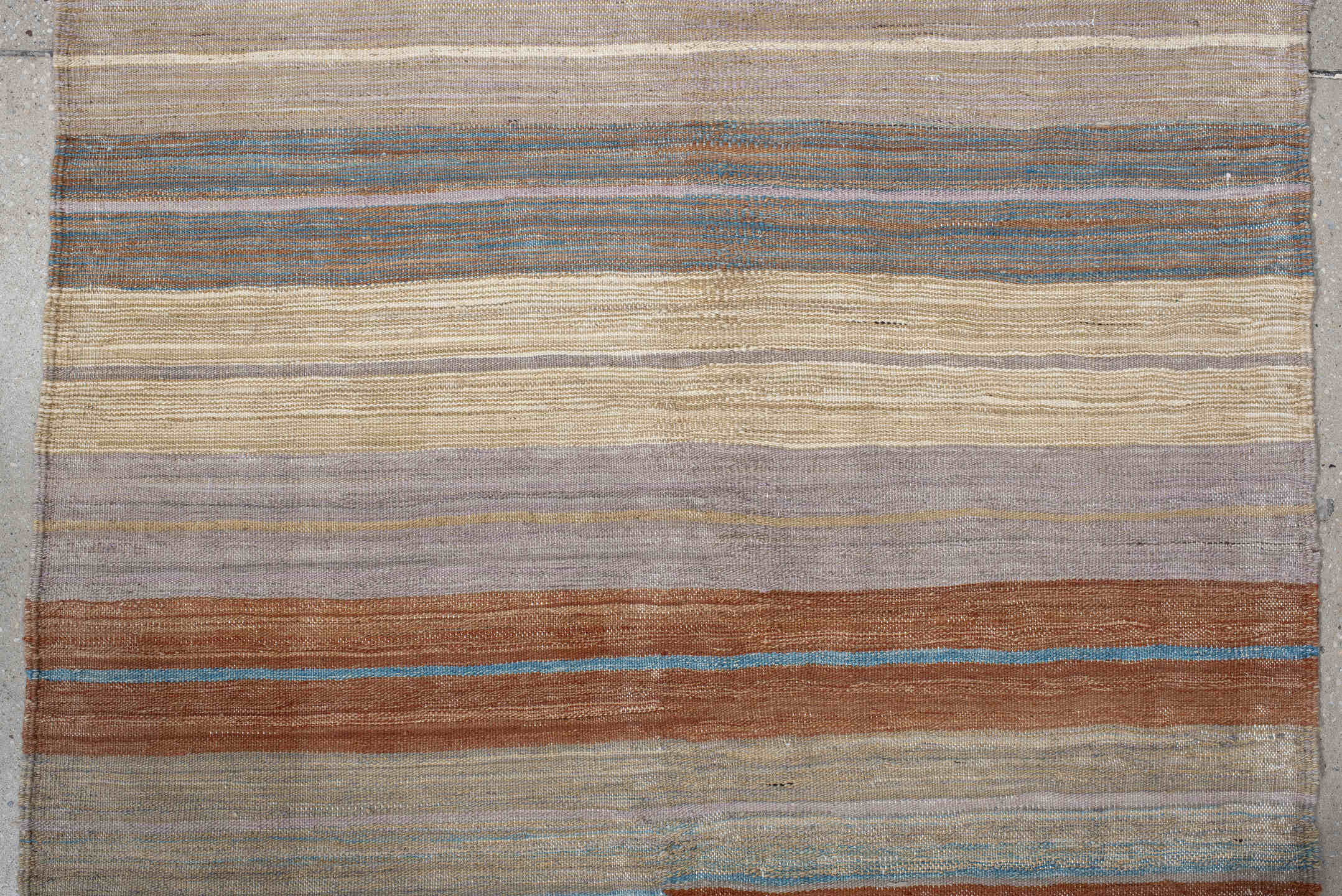 3' x 9' one-of-a-kind handmade vintage Kilim runner rug. Color palette: ivory, taupe, rust, pale blue, beige, camel