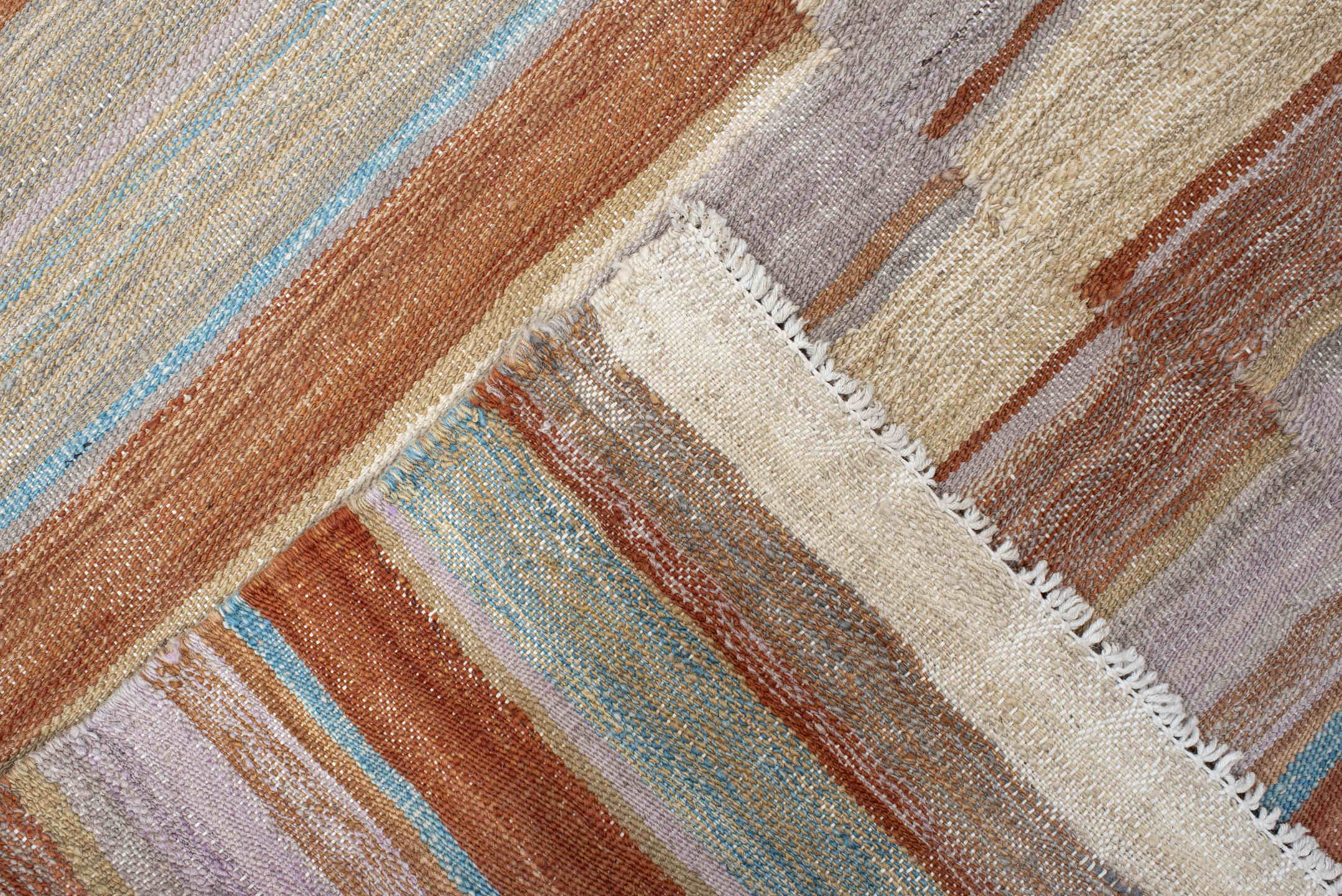 3' x 9' one-of-a-kind handmade vintage Kilim runner rug. Color palette: ivory, taupe, rust, pale blue, beige, camel