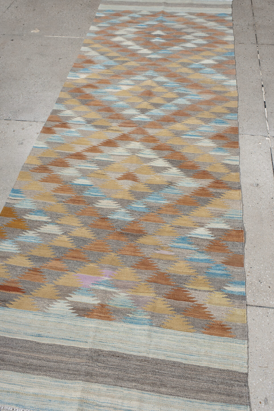 3' x 9' one-of-a-kind handmade vintage Kilim runner rug. Color palette: taupe, camel, ivory, rust, pale_blue, gray, beige