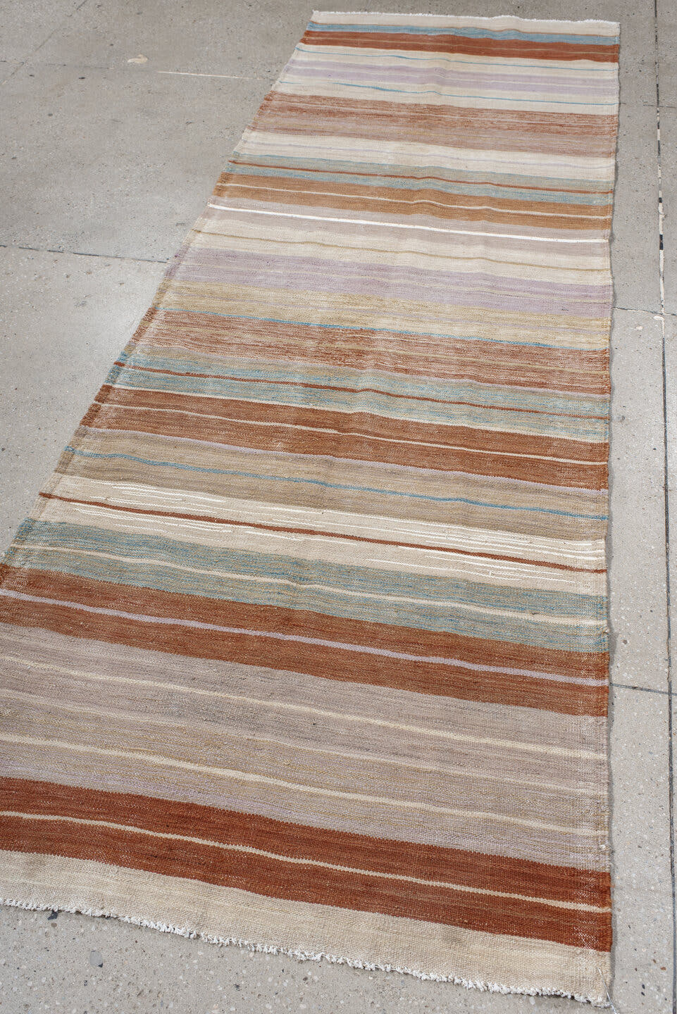 3' x 9' one-of-a-kind handmade vintage Kilim runner rug. Color palette: ivory, rust, taupe, sky_blue, lavender, beige