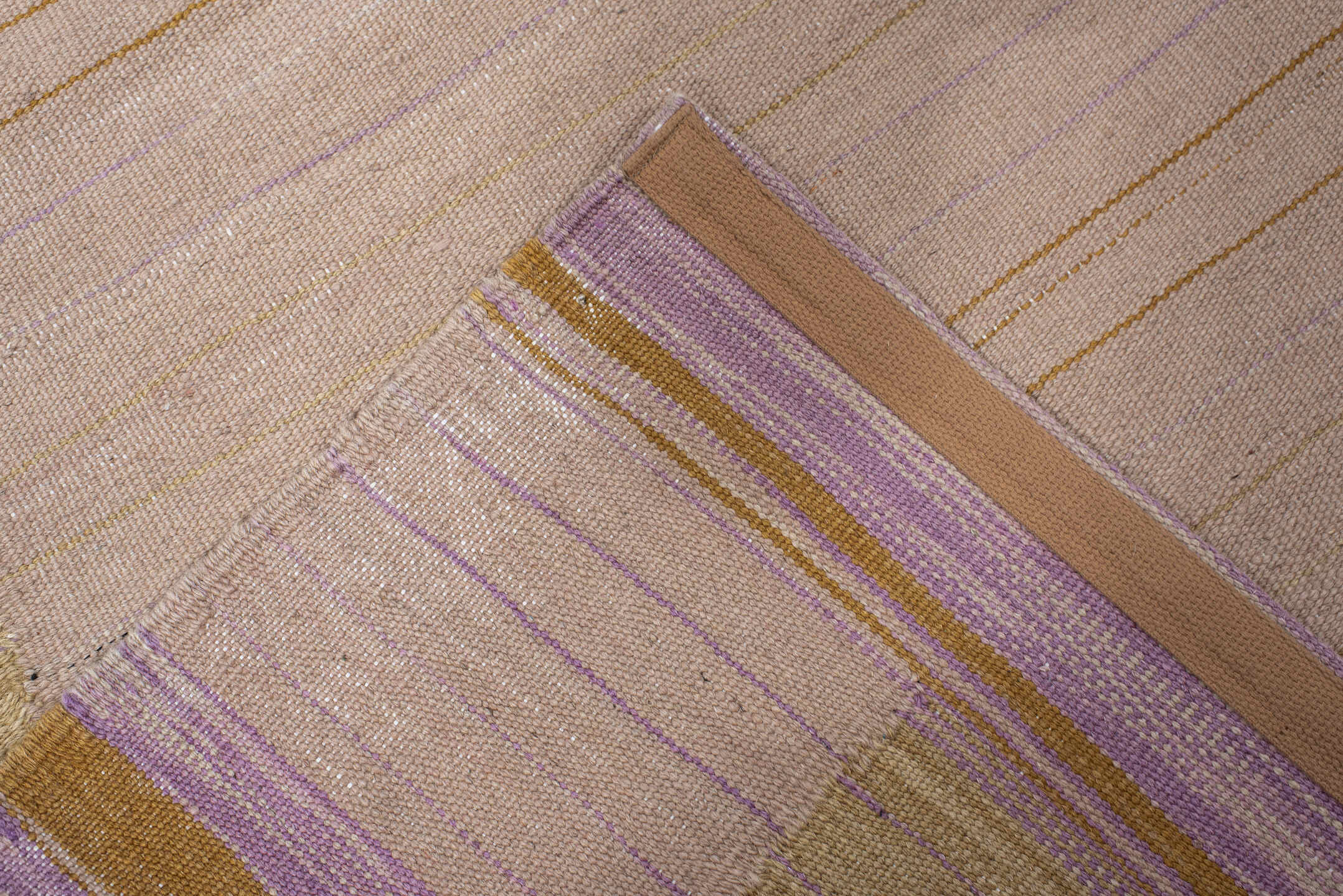 2' x 10' one-of-a-kind handmade vintage Kilim runner rug. Color palette: blush, gold, ivory, lavender, beige, pink