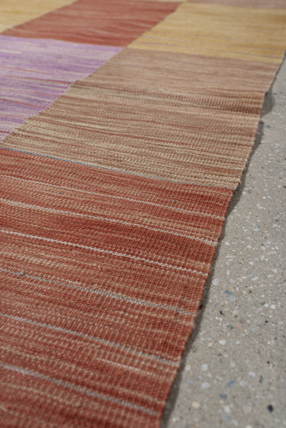 2' x 10' one-of-a-kind handmade vintage Kilim runner rug. Color palette: camel, rose, rust, lavender, tan, beige, pink, red