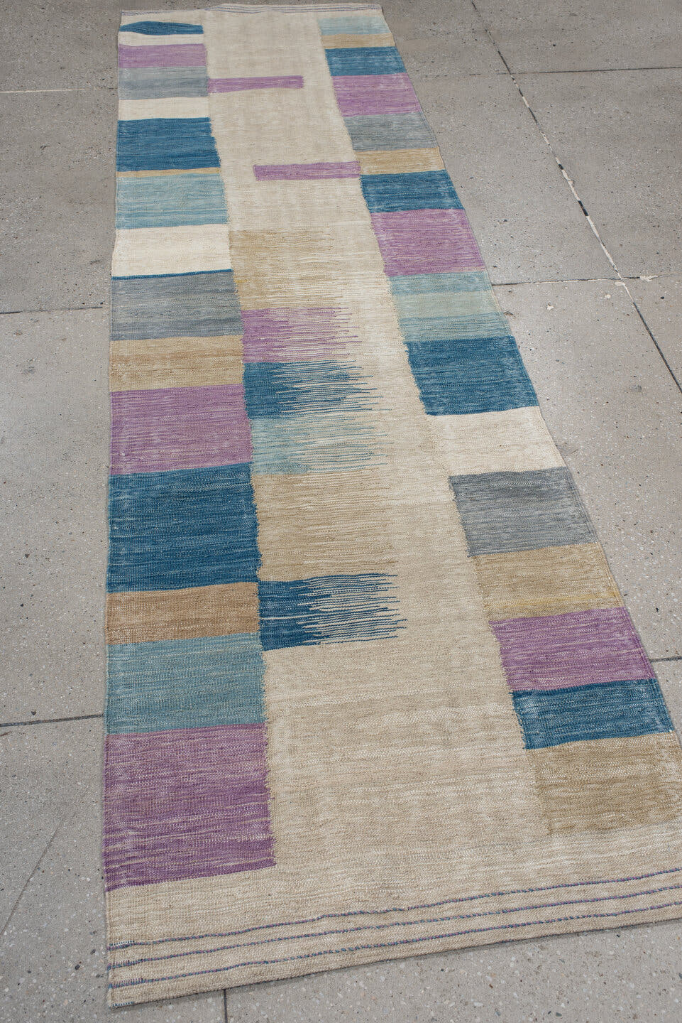 2' x 9' one-of-a-kind handmade vintage Kilim runner rug. Color palette: ivory, blue, lavender, light_blue, gray, beige