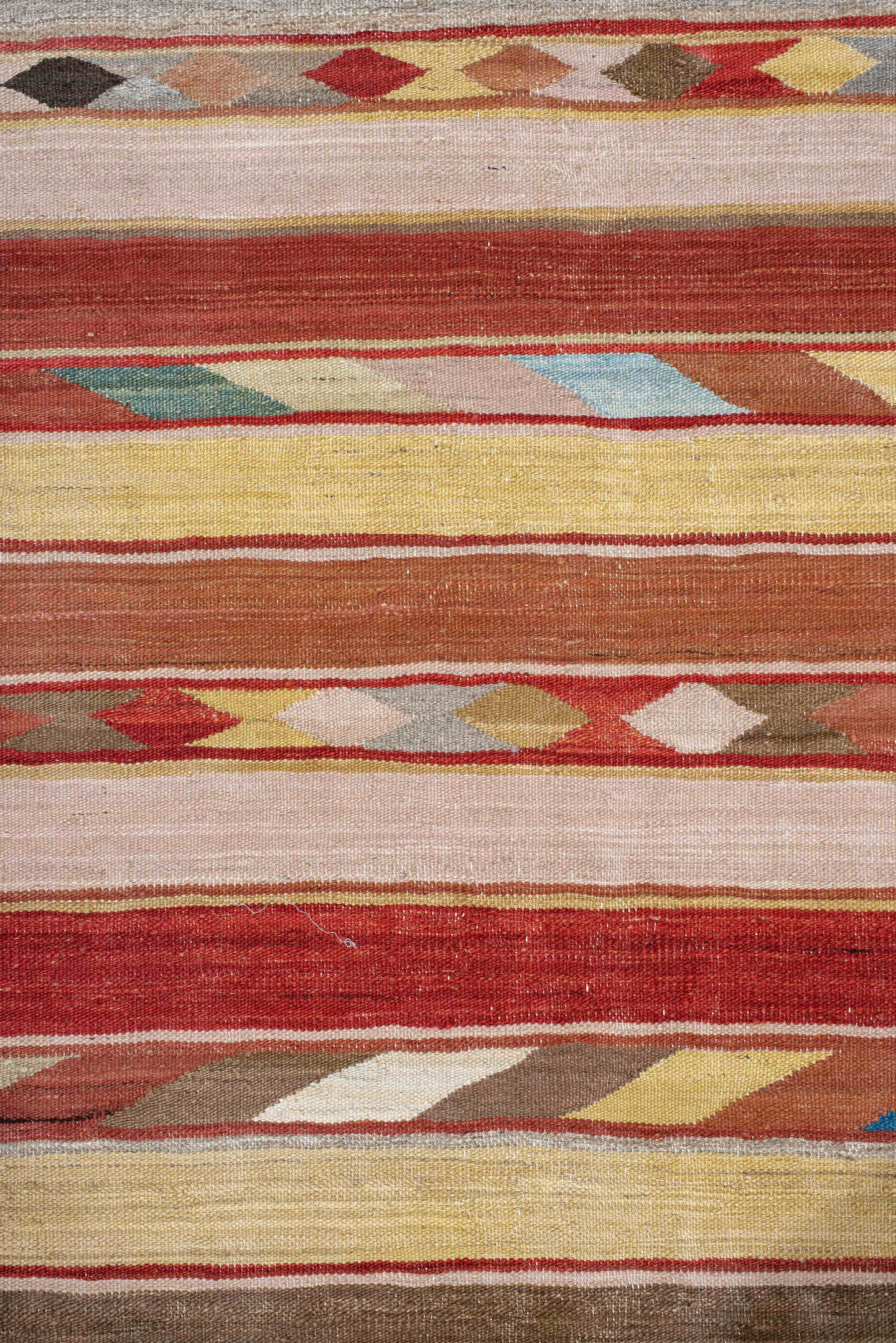 3' x 9' one-of-a-kind handmade vintage Kilim runner rug. Color palette: terra cotta, ivory, camel, taupe, rust, muted blue