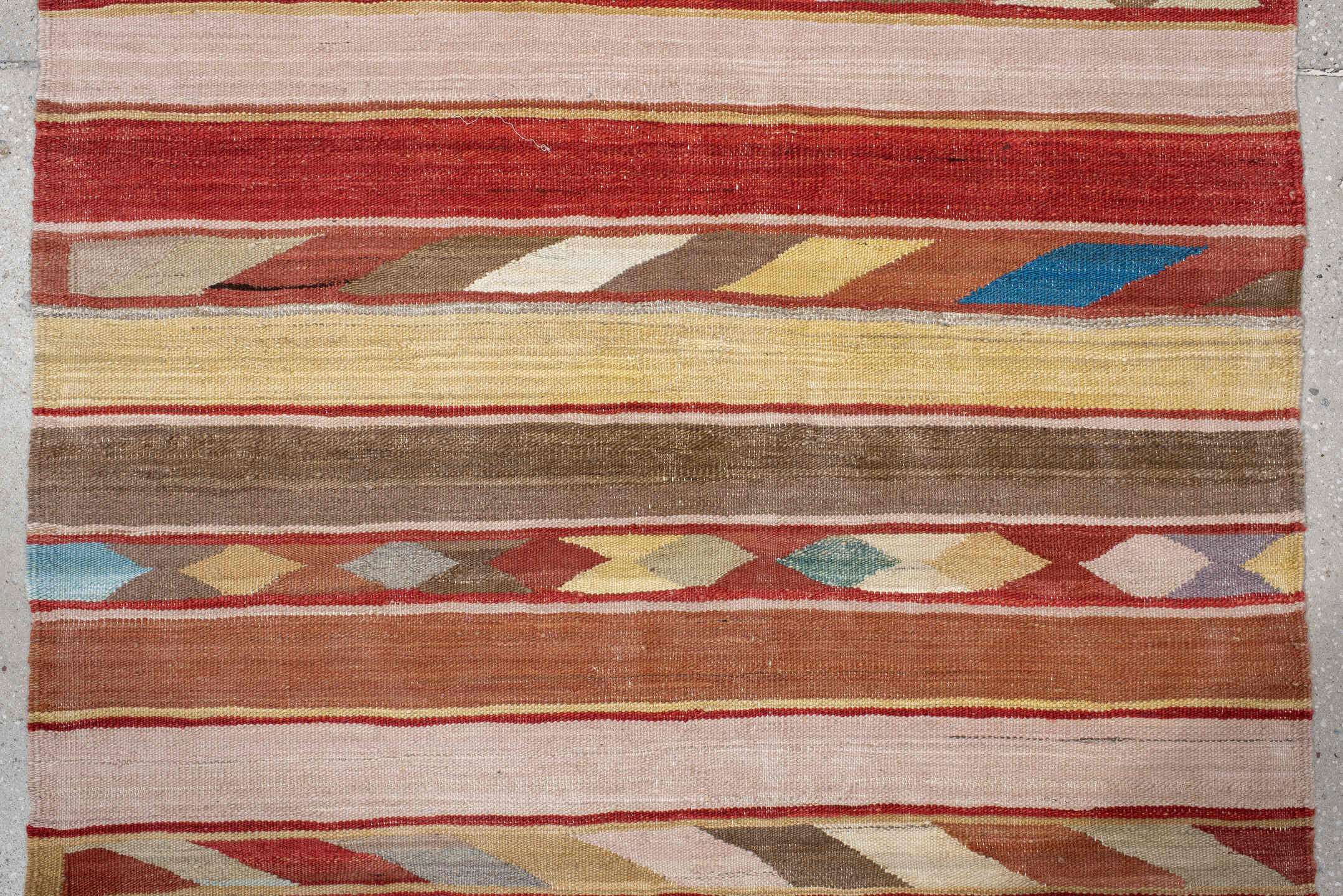 3' x 9' one-of-a-kind handmade vintage Kilim runner rug. Color palette: terra cotta, ivory, camel, taupe, rust, muted blue