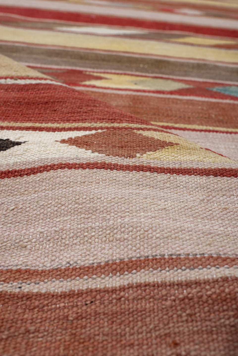 3' x 9' one-of-a-kind handmade vintage Kilim runner rug. Color palette: terra cotta, ivory, camel, taupe, rust, muted blue