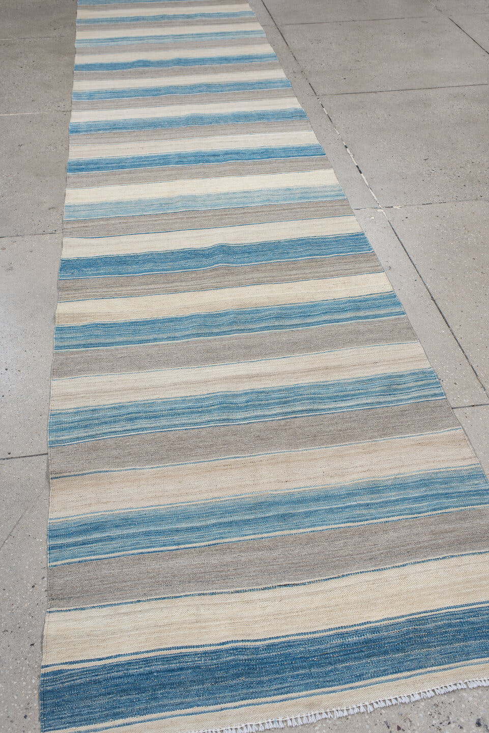 3' x 13' one-of-a-kind handmade vintage Kilim runner rug. Color palette: ivory, sky blue, taupe, cream, light blue, beige