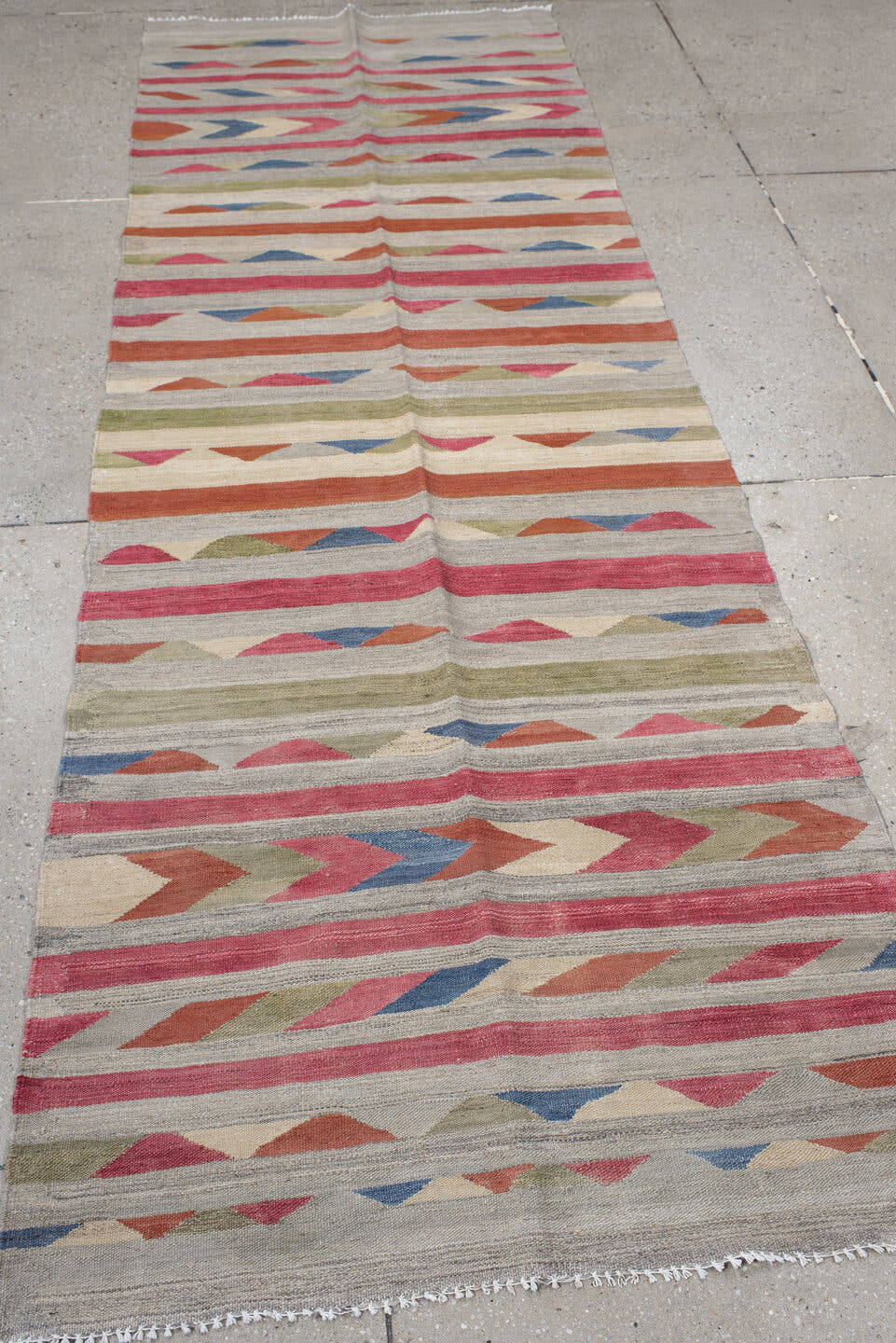 3' x 7' one-of-a-kind handmade vintage Kilim runner rug. Color palette: taupe, rose, ivory, rust, olive, blue, coral, beige