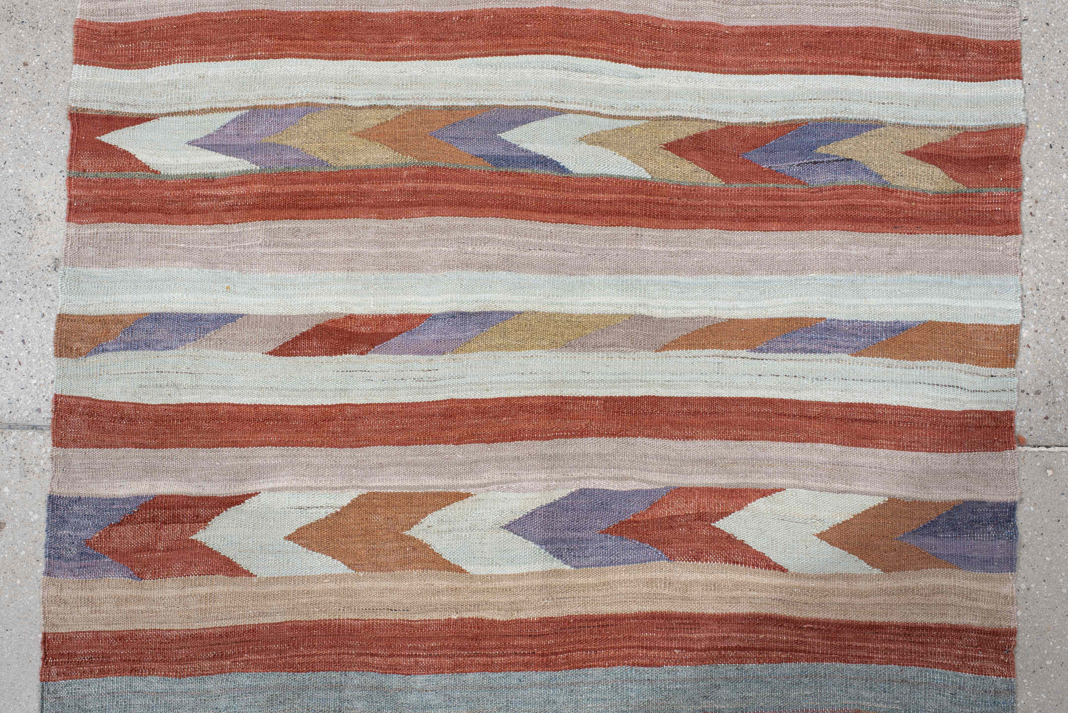 3' x 7' one-of-a-kind handmade vintage Kilim runner rug. Color palette: terra cotta, ivory, taupe, lavender, sky blue, sage