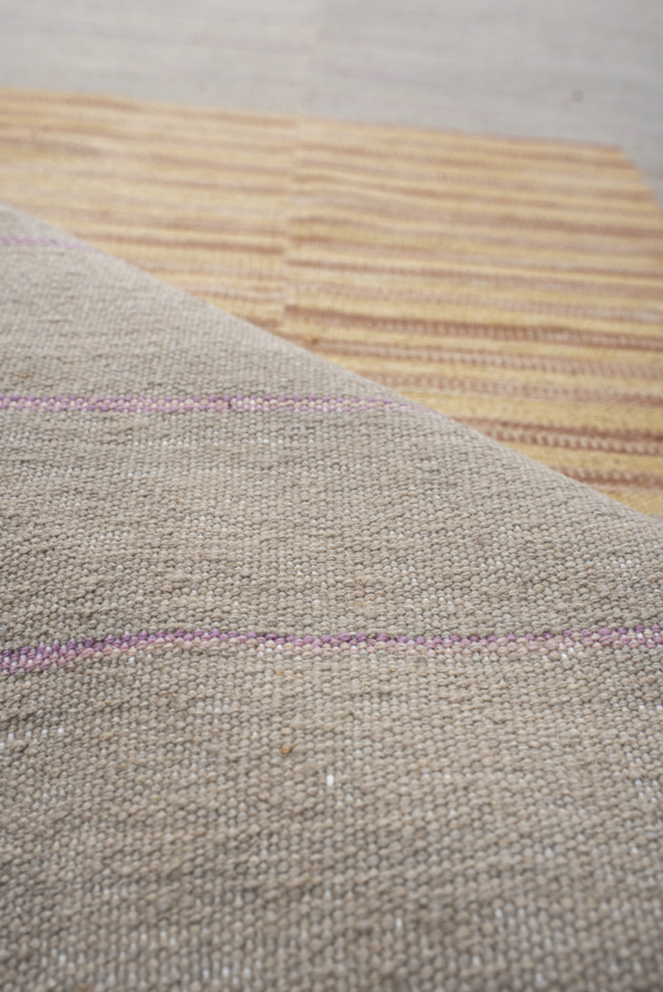 2' x 8' one-of-a-kind handmade vintage Kilim runner rug. Color palette: gray, light gray, off-white, pink, brown, orange