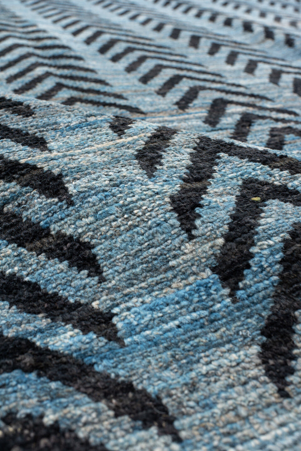 6' x 9' one-of-a-kind handmade vintage Tulu medium size rug. Color palette: sky blue, charcoal, slate, black, light blue