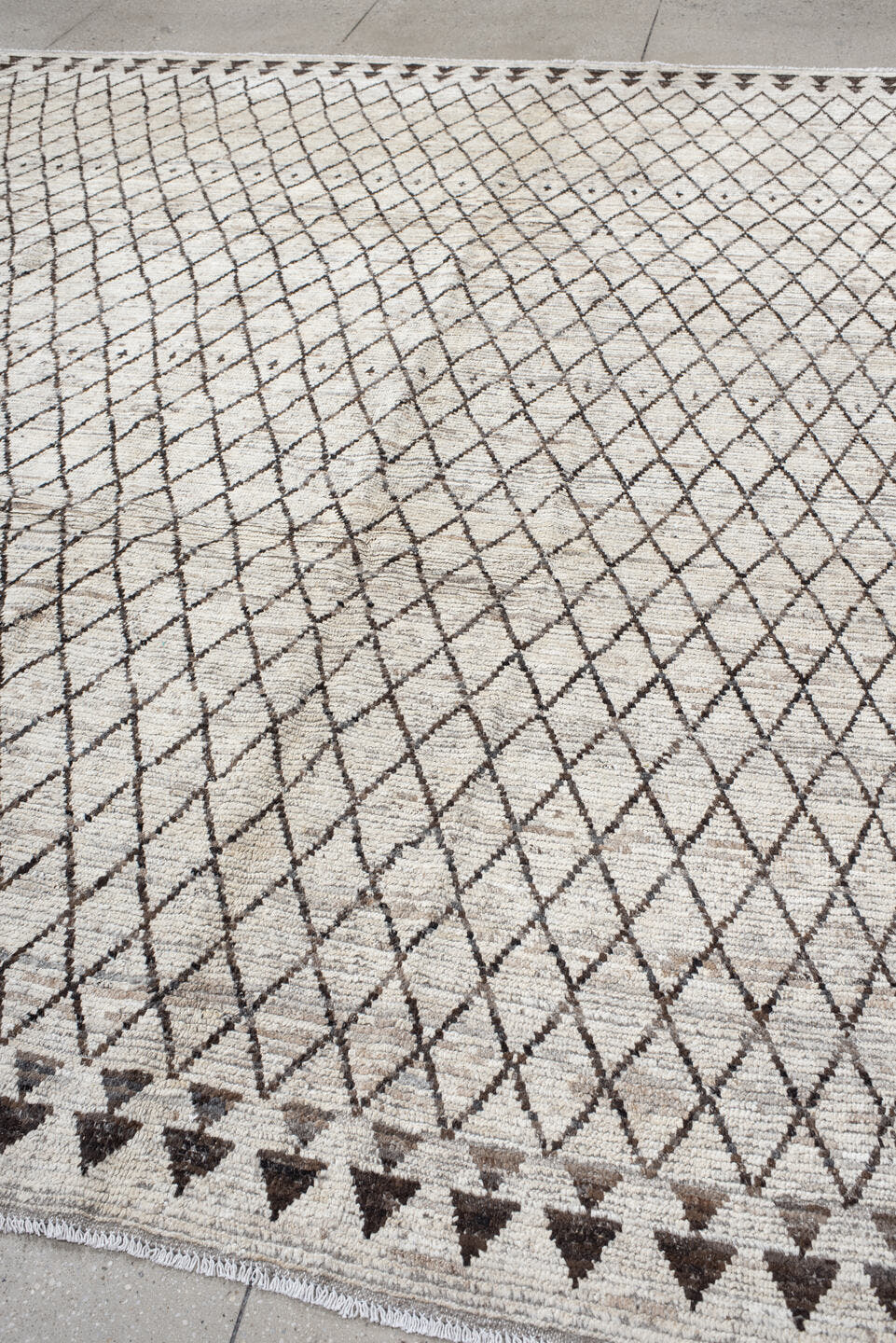 9' x 11' one-of-a-kind handmade vintage Tulu large size rug. Color palette: ivory, charcoal, taupe, brown, gray, black