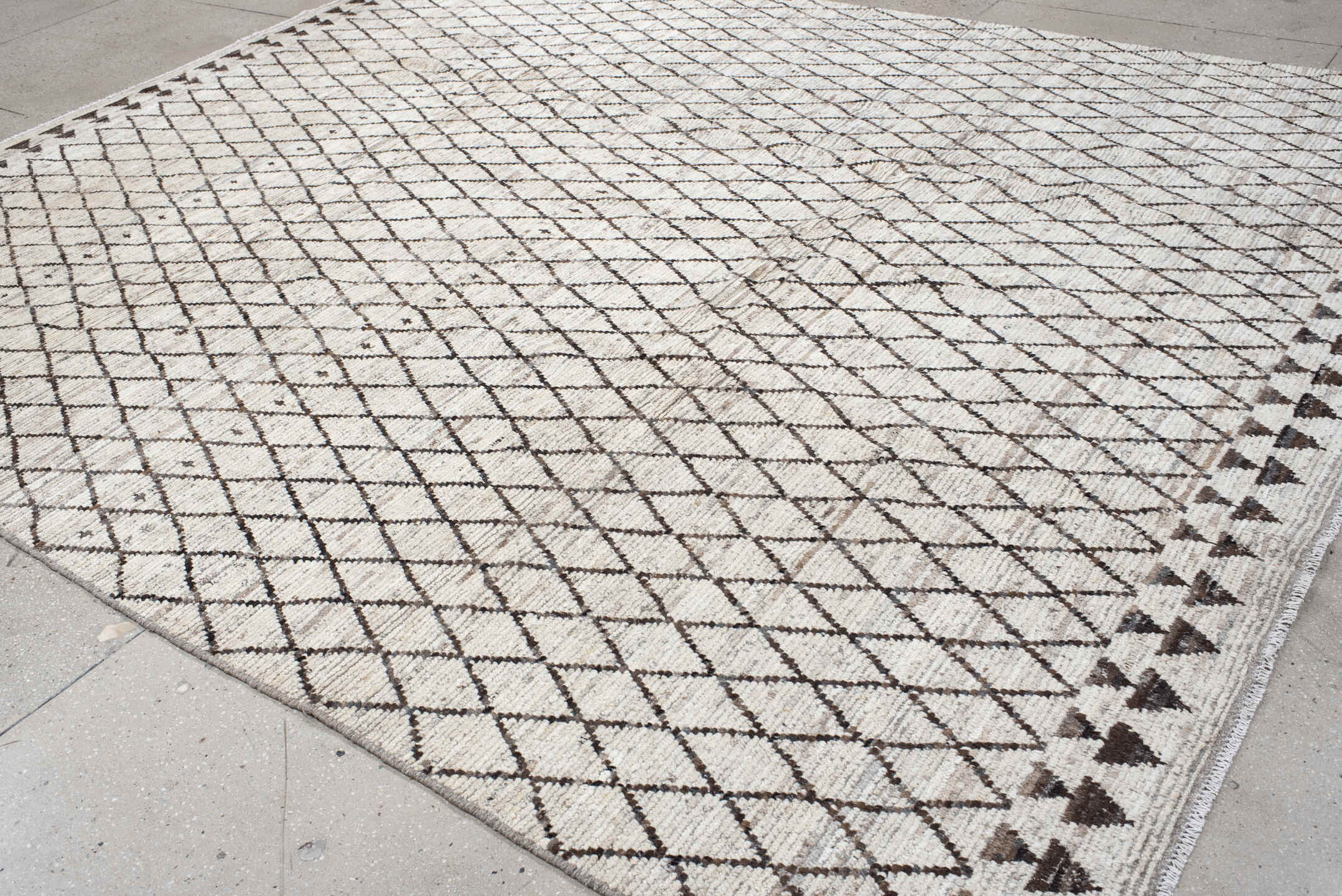 9' x 11' one-of-a-kind handmade vintage Tulu large size rug. Color palette: ivory, charcoal, taupe, brown, gray, black