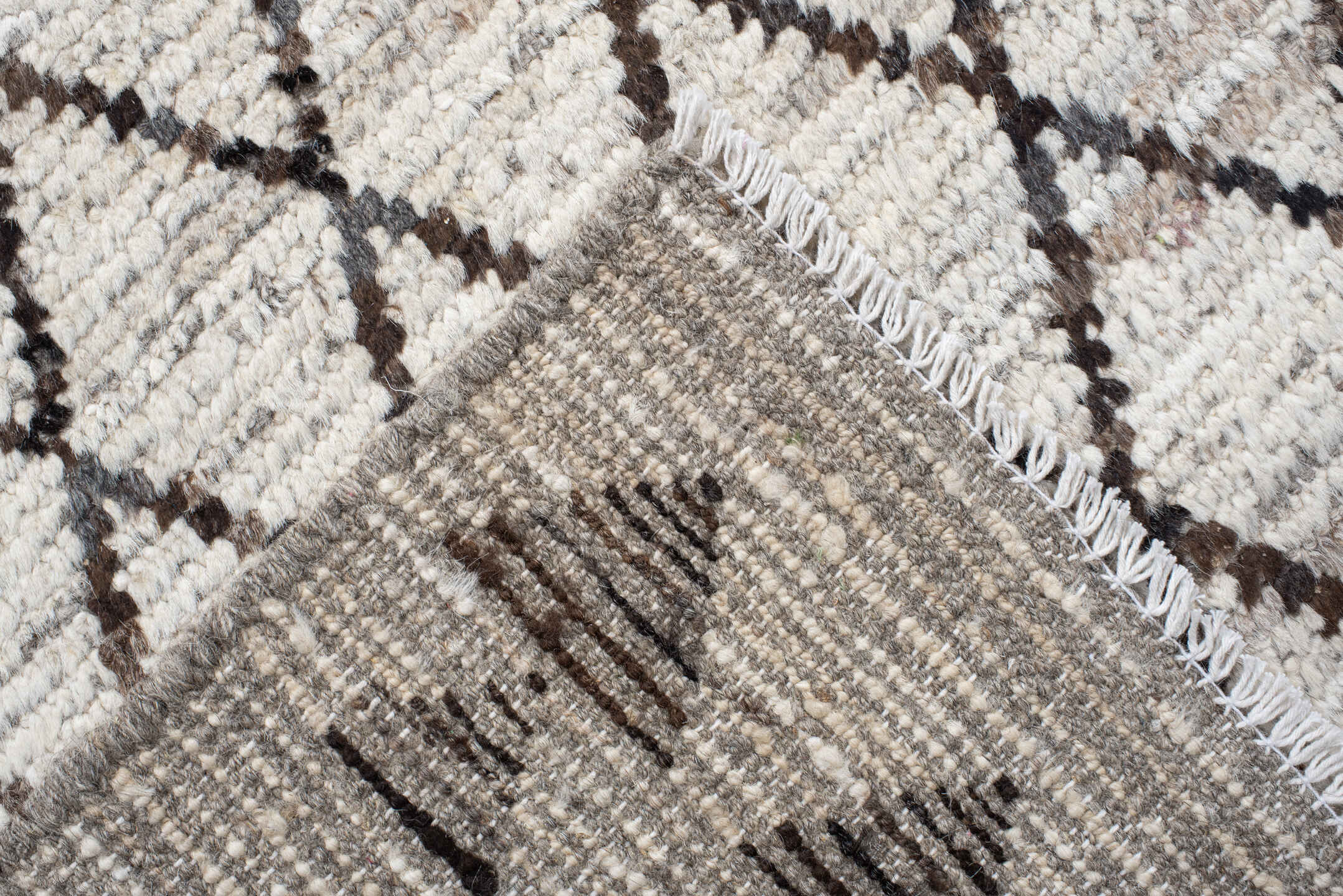 9' x 11' one-of-a-kind handmade vintage Tulu large size rug. Color palette: ivory, charcoal, taupe, brown, gray, black