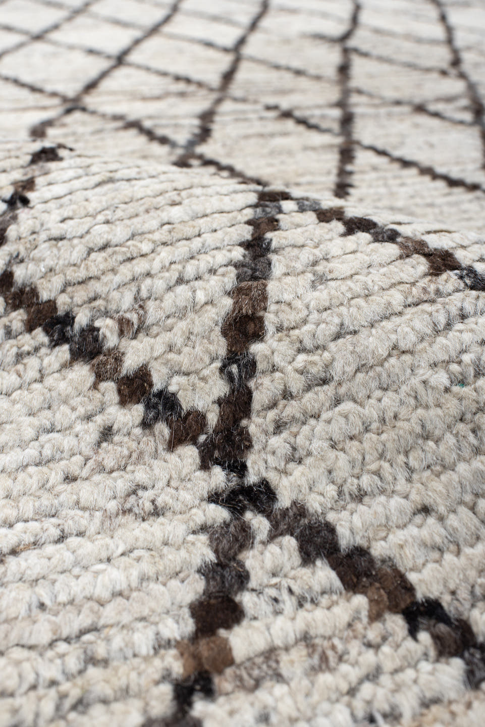 9' x 11' one-of-a-kind handmade vintage Tulu large size rug. Color palette: ivory, charcoal, taupe, brown, gray, black