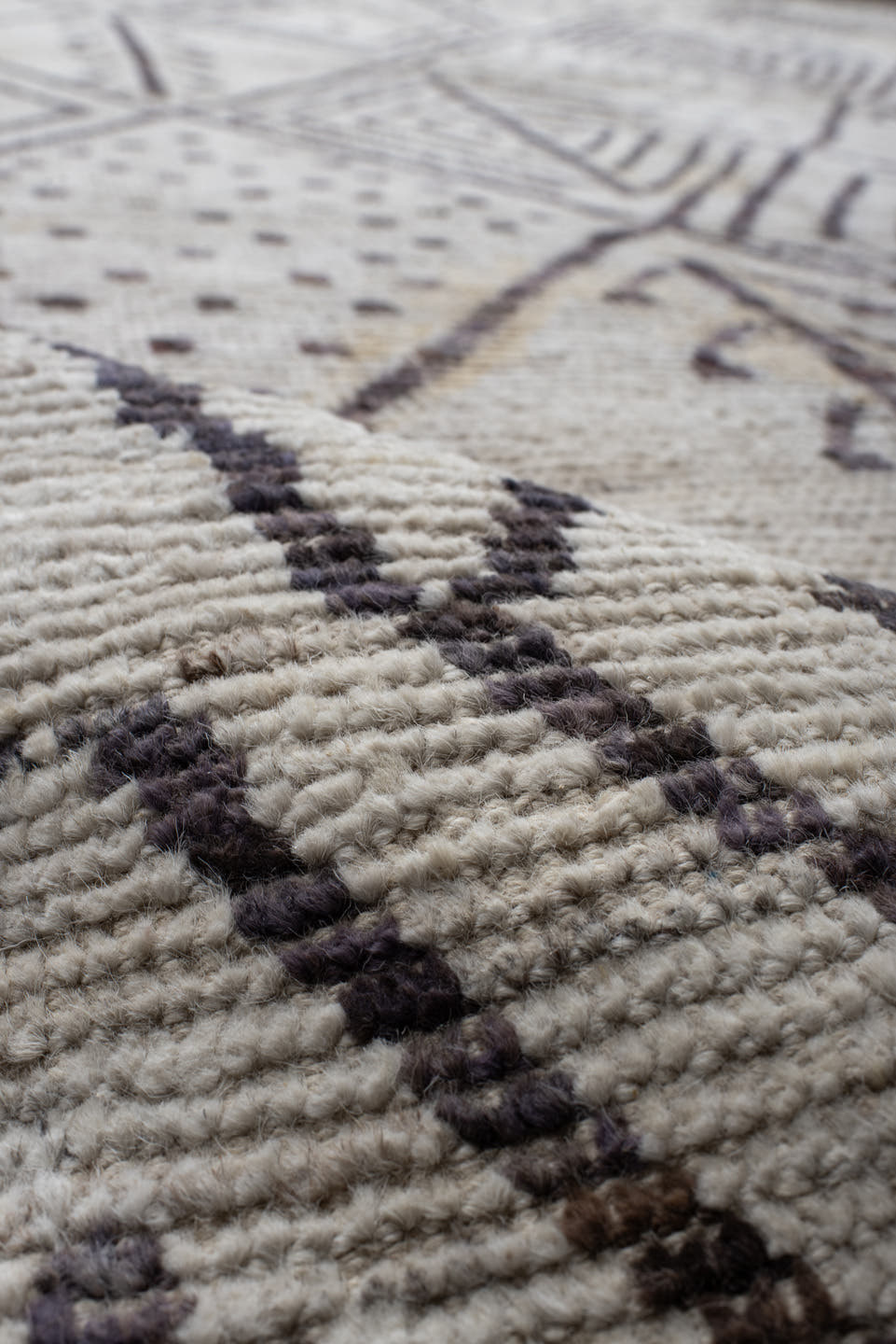 10' x 14' one-of-a-kind handmade vintage Tulu large size rug. Color palette: ivory, charcoal, taupe, brown, gray, black