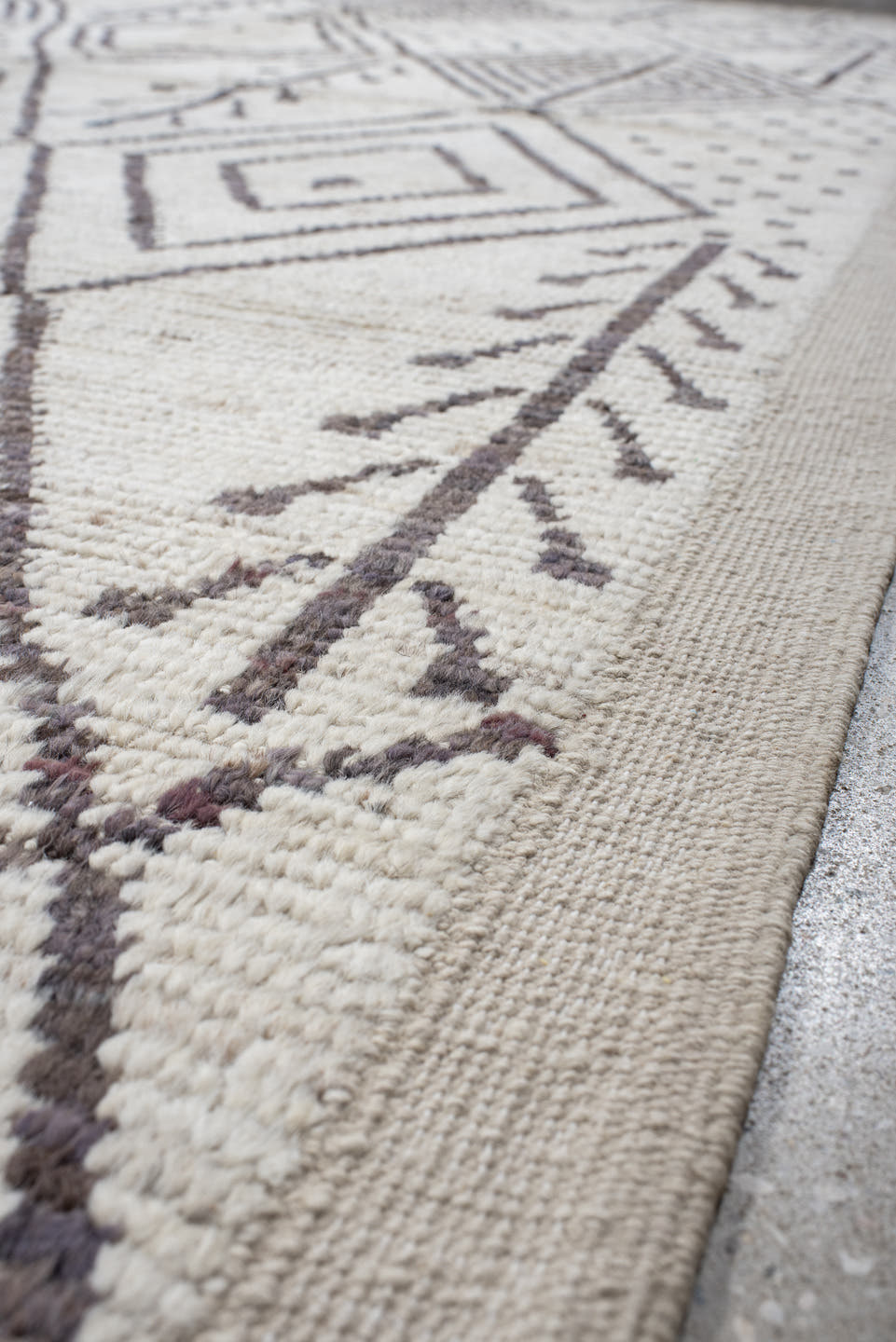 10' x 14' one-of-a-kind handmade vintage Tulu large size rug. Color palette: ivory, charcoal, taupe, brown, gray, black