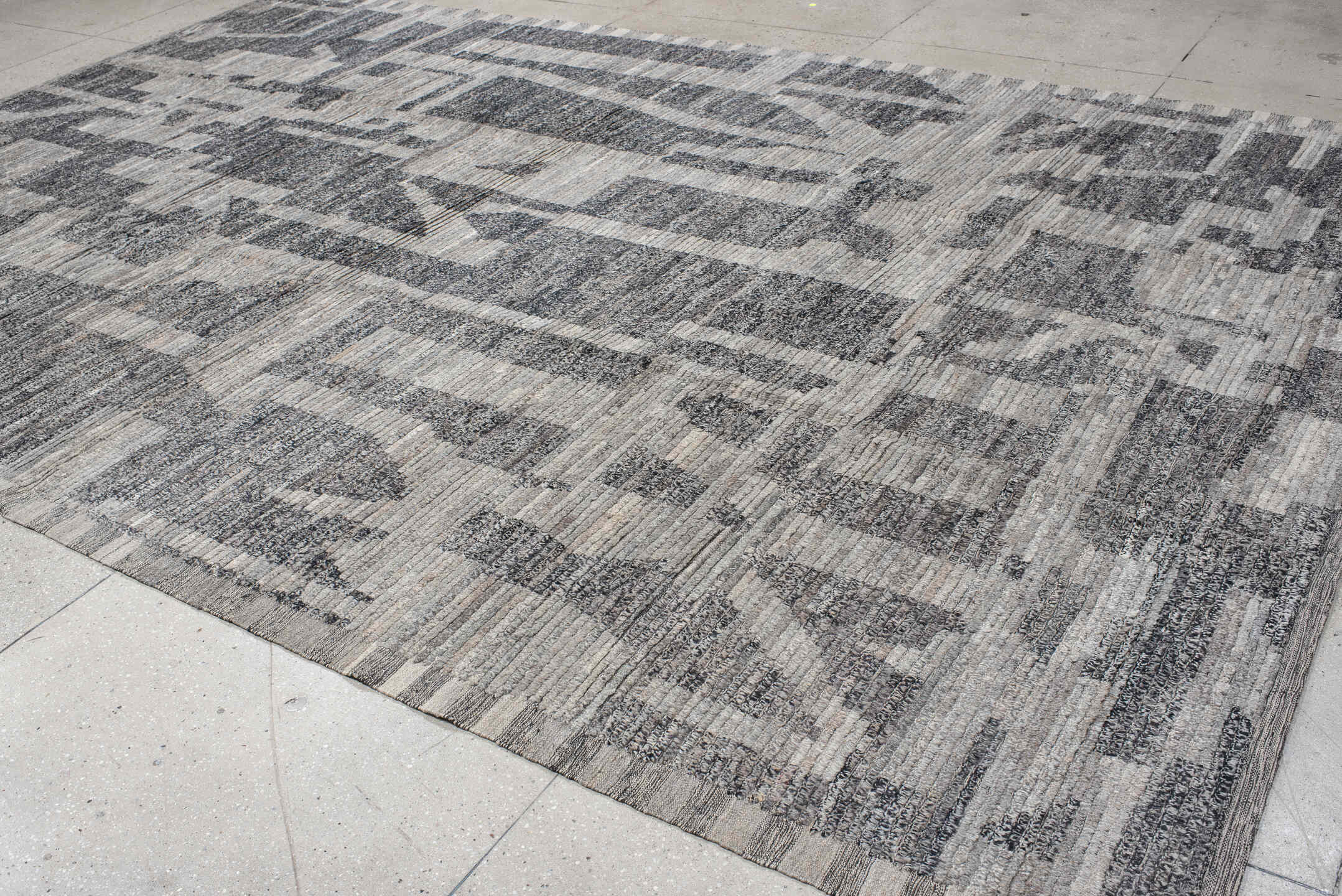 9' x 14' one-of-a-kind handmade vintage Tulu large size rug. Color palette: gray, charcoal, slate, ivory, taupe, black