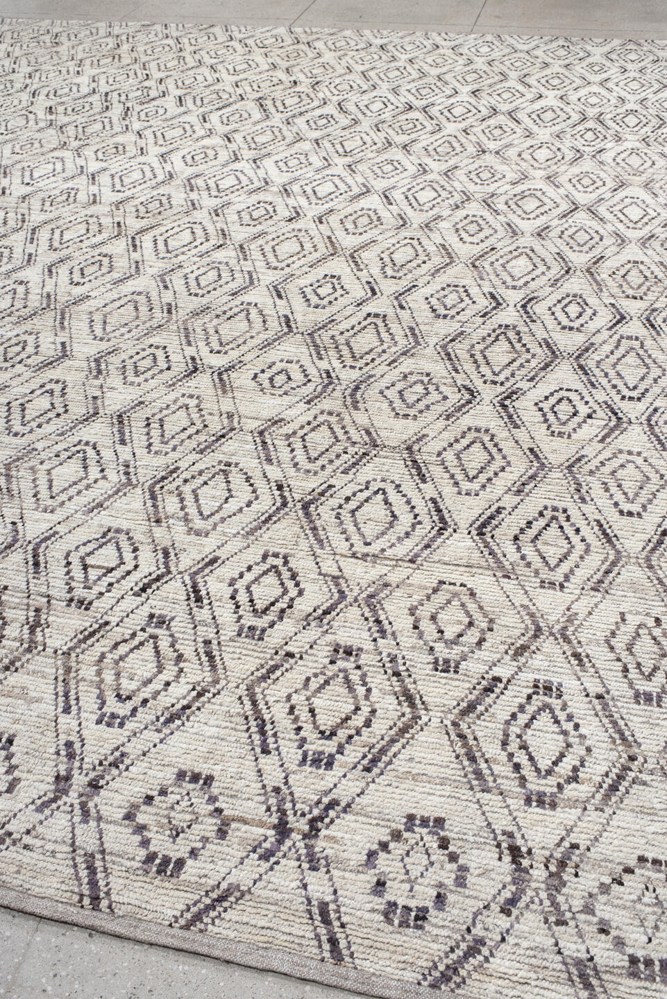 12' x 14' one-of-a-kind handmade vintage Tulu oversize rug. Color palette: ivory, charcoal, taupe, brown, gray, black, beige
