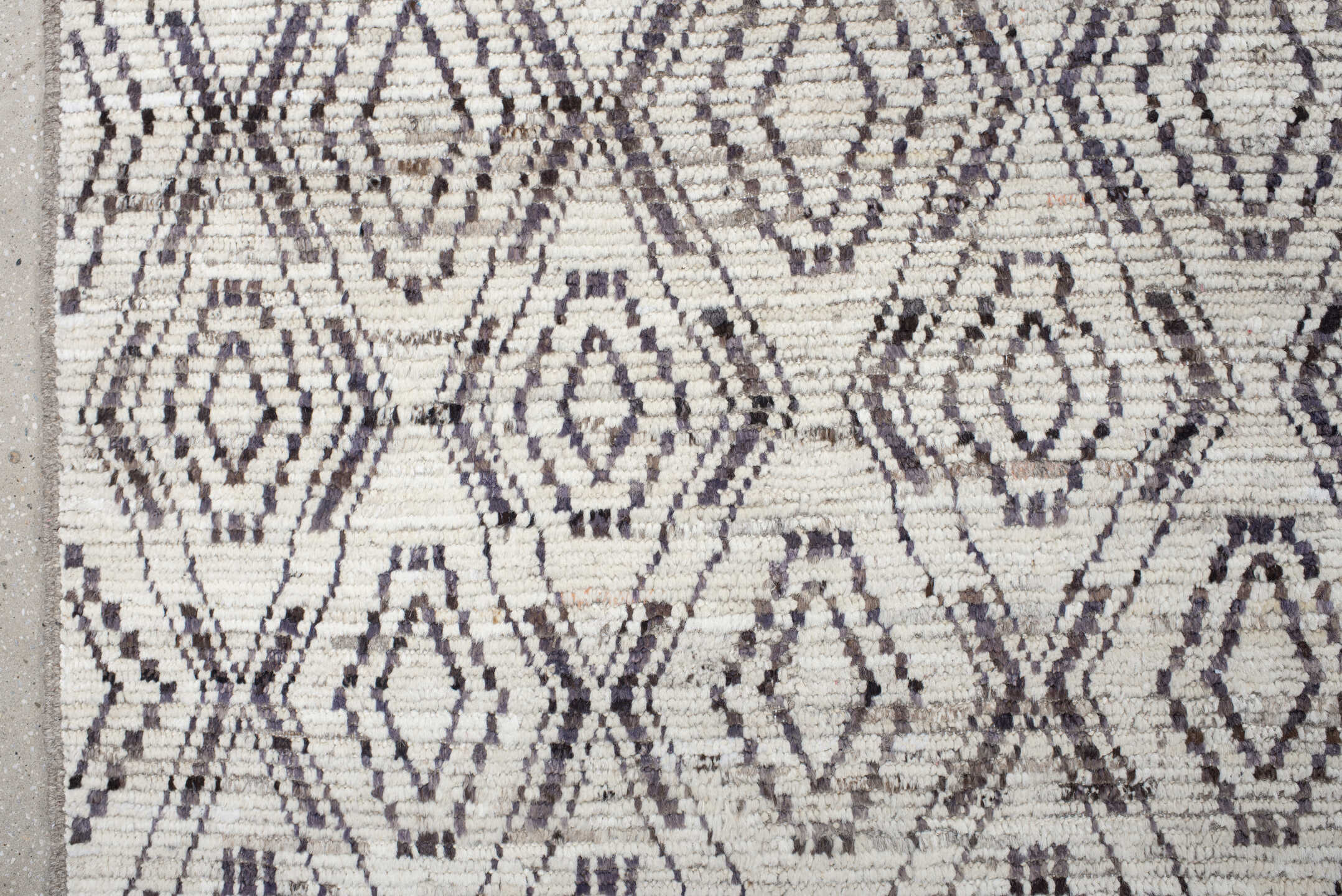 12' x 14' one-of-a-kind handmade vintage Tulu oversize rug. Color palette: ivory, charcoal, taupe, brown, gray, black, beige
