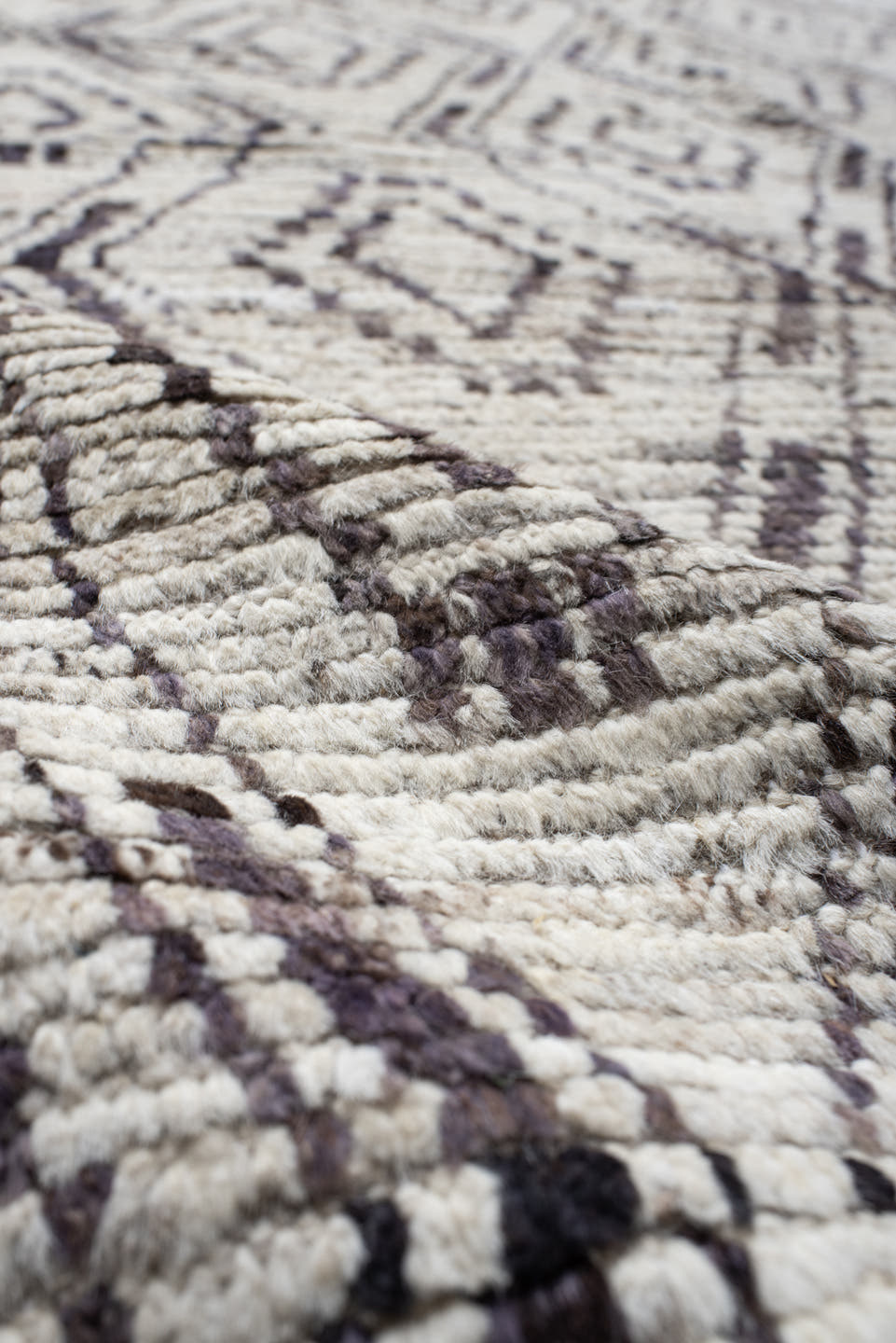 12' x 14' one-of-a-kind handmade vintage Tulu oversize rug. Color palette: ivory, charcoal, taupe, brown, gray, black, beige