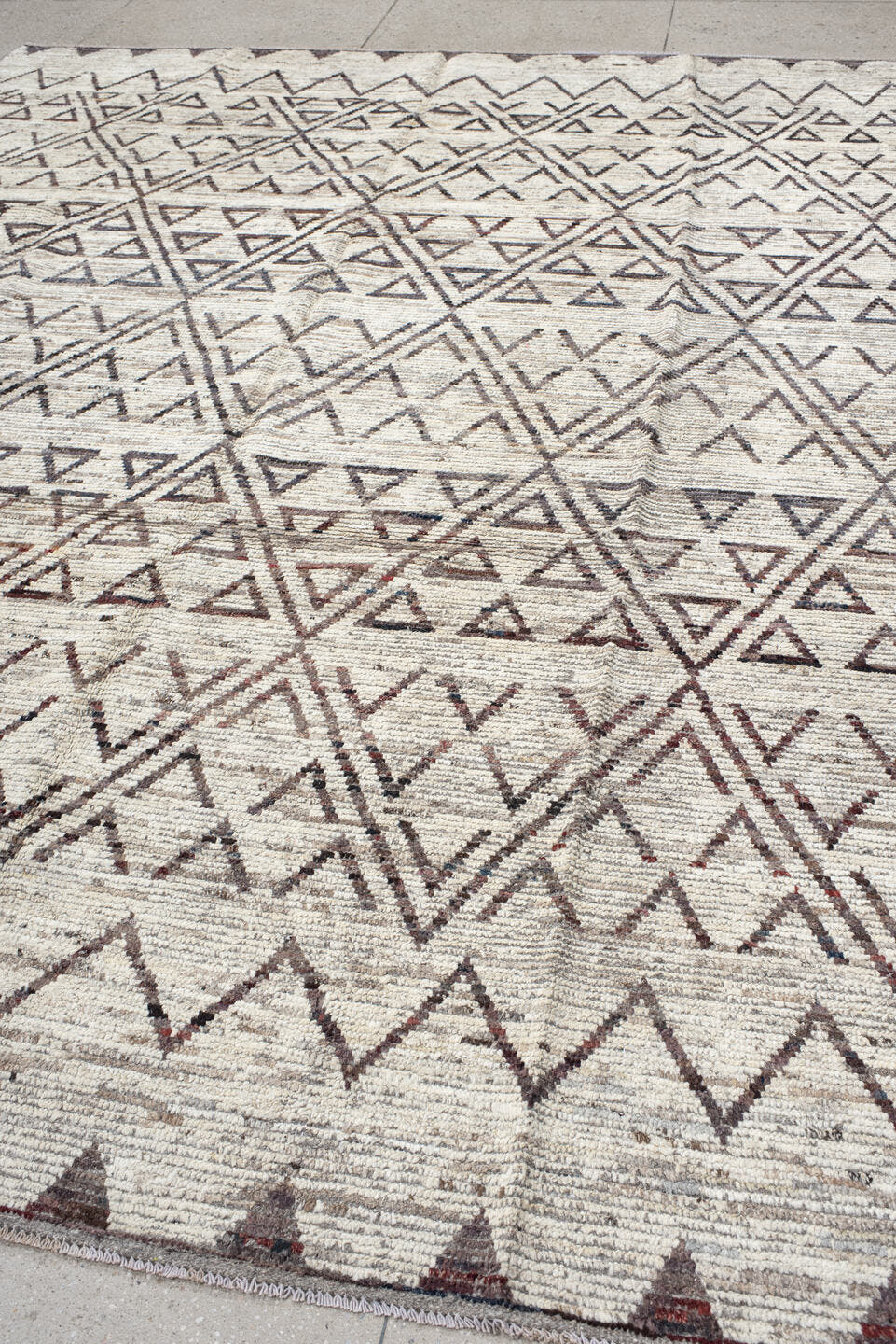 9' x 11' one-of-a-kind handmade vintage Tulu large size rug. Color palette: ivory, brown, taupe, charcoal, beige, gray