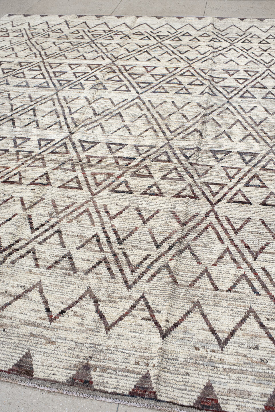9' x 11' one-of-a-kind handmade vintage Tulu large size rug. Color palette: ivory, brown, taupe, charcoal, beige, gray