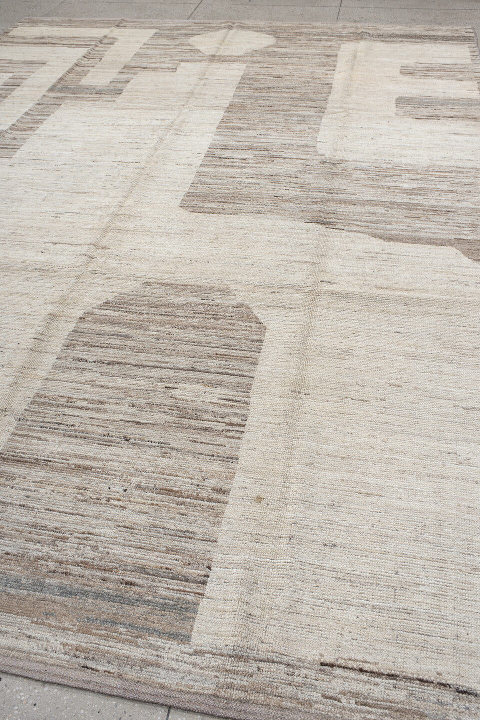 9' x 13' one-of-a-kind handmade vintage Tulu large size rug. Color palette: ivory, taupe, beige, cream, greige, stone, gray