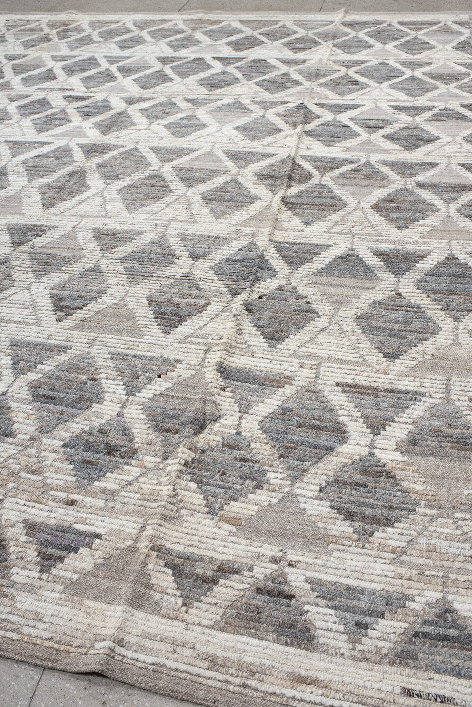 11' x 13' one-of-a-kind handmade vintage Tulu oversize rug. Color palette: gray, ivory, taupe, greige, beige