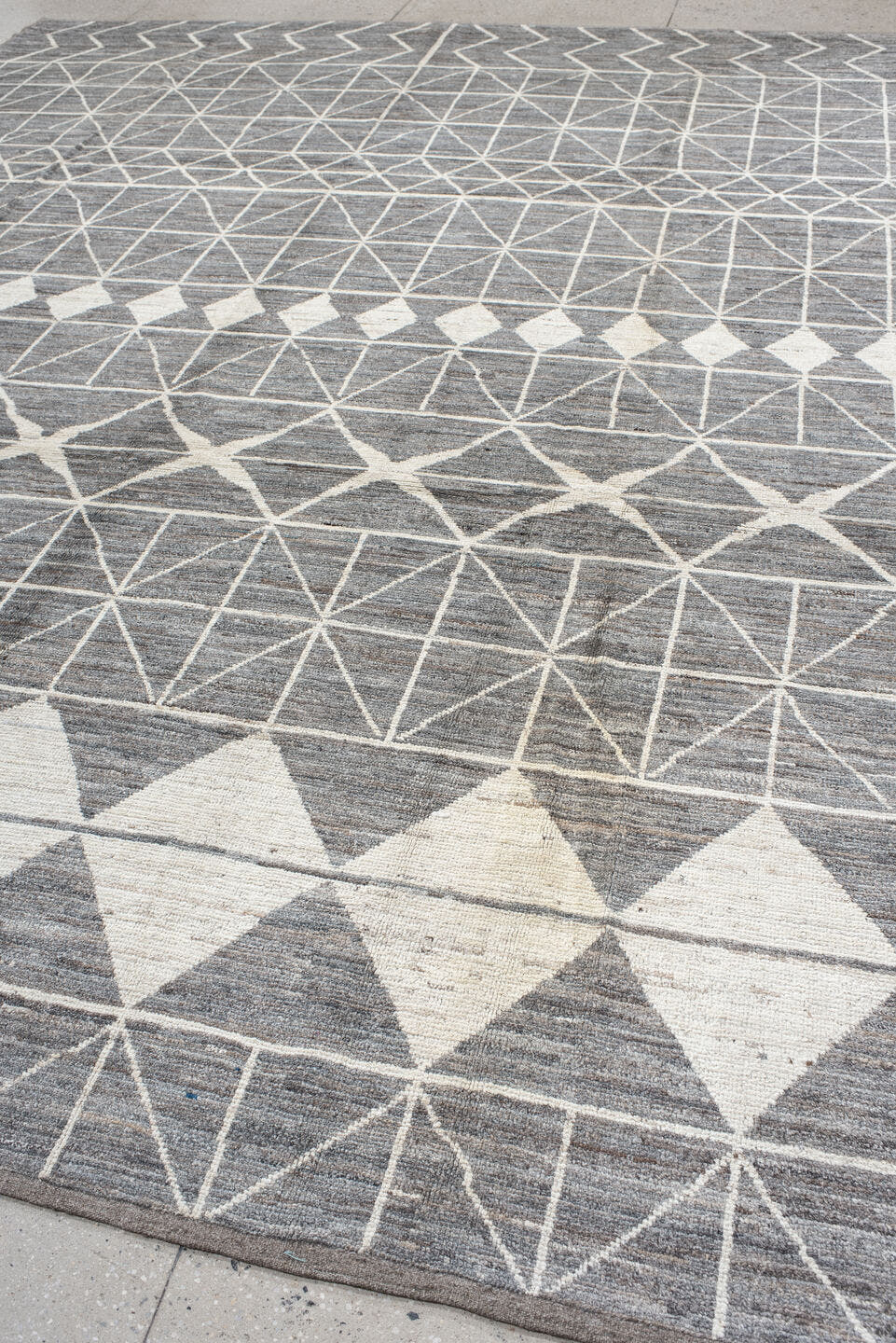 9' x 13' one-of-a-kind handmade vintage Tulu large size rug. Color palette: gray, ivory, charcoal, taupe, black, beige