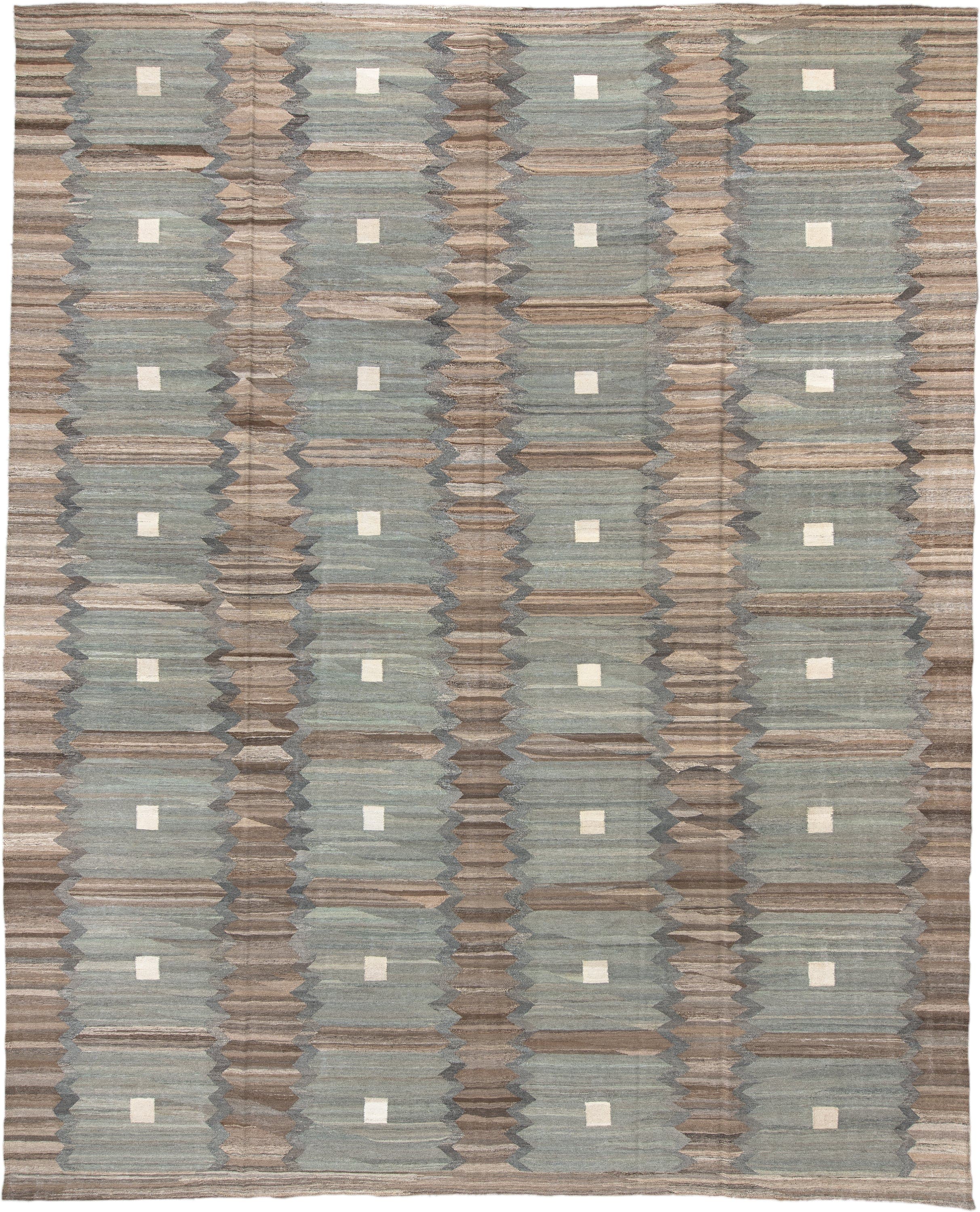 13' x 16' one-of-a-kind handmade vintage Kilim oversize rug. Color palette: taupe, blue_gray, ivory, slate, beige, brown