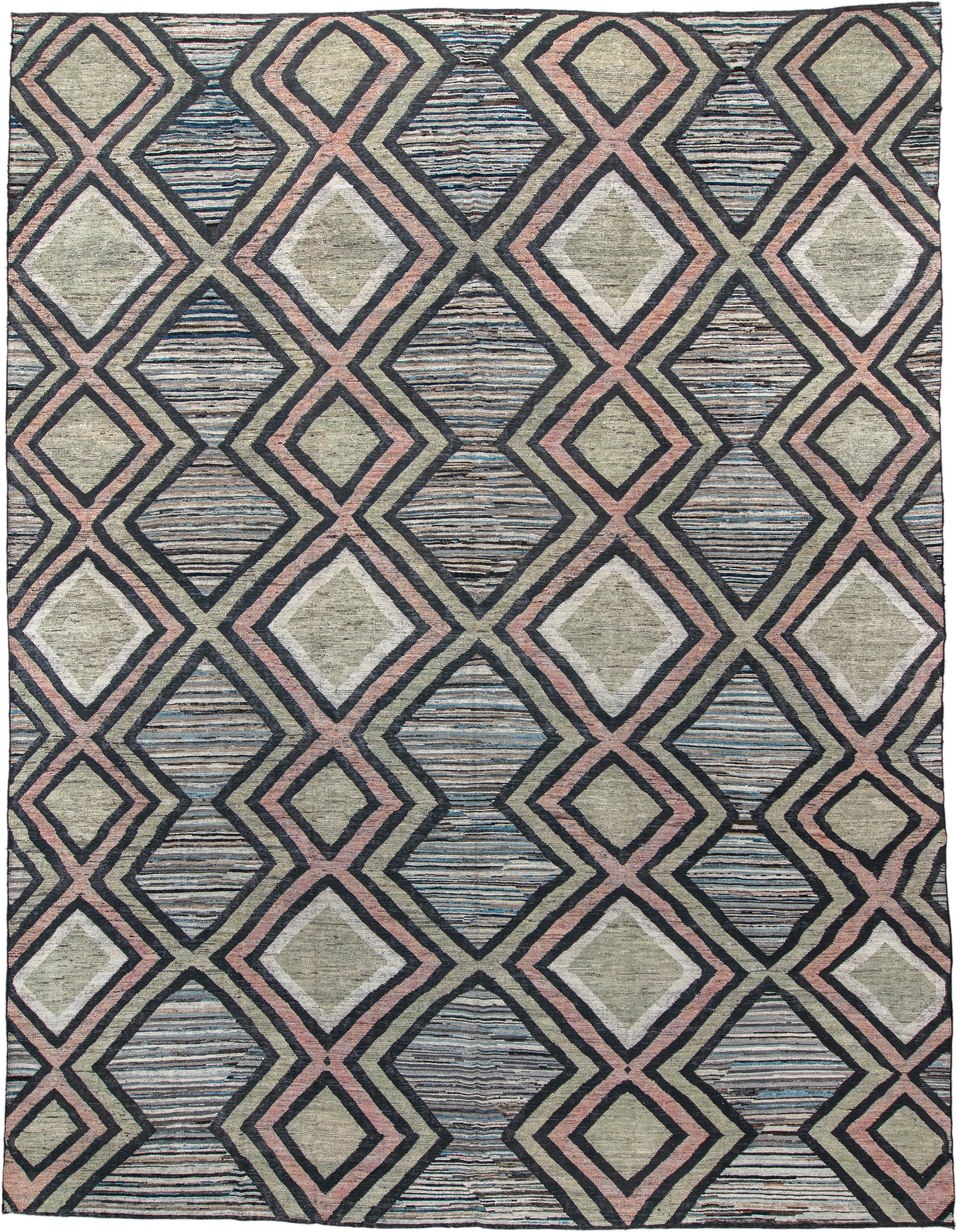 13' x 16' one-of-a-kind handmade vintage Tulu oversize rug. Color palette: ivory, charcoal, blush, pale blue, sage, taupe